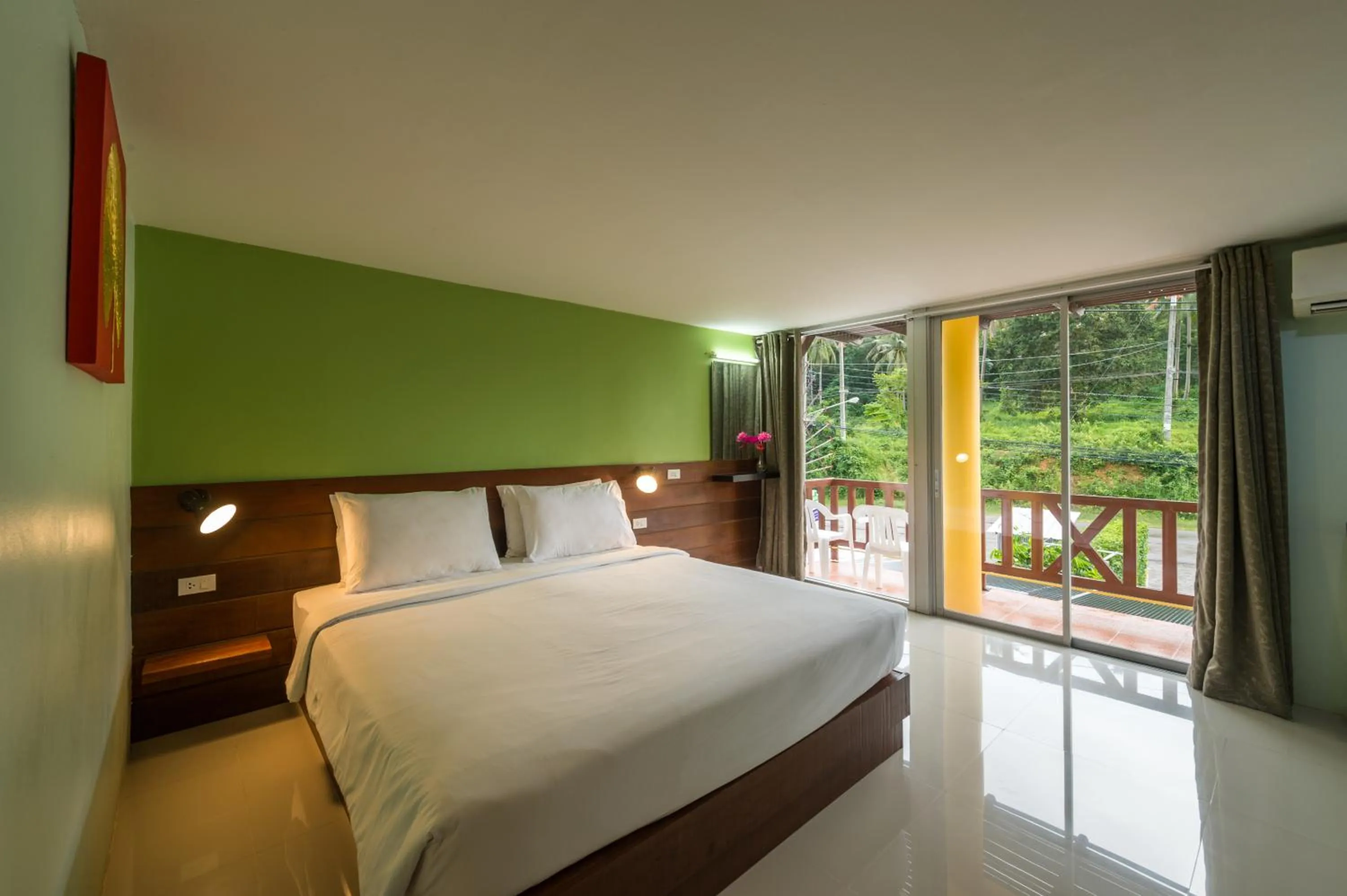 Bed in Lanta Thip House by Swiss-Belhotel