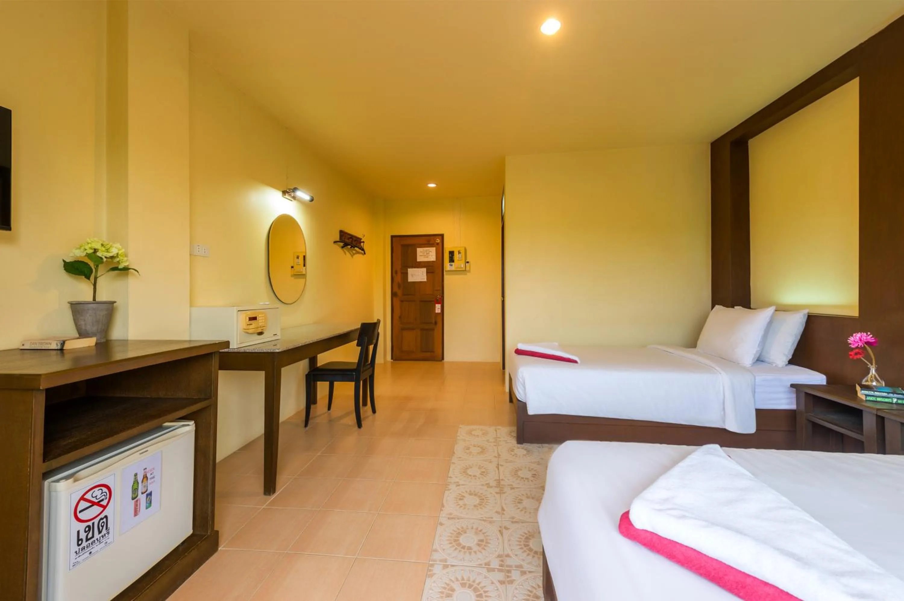 Bed in Lanta Thip House by Swiss-Belhotel