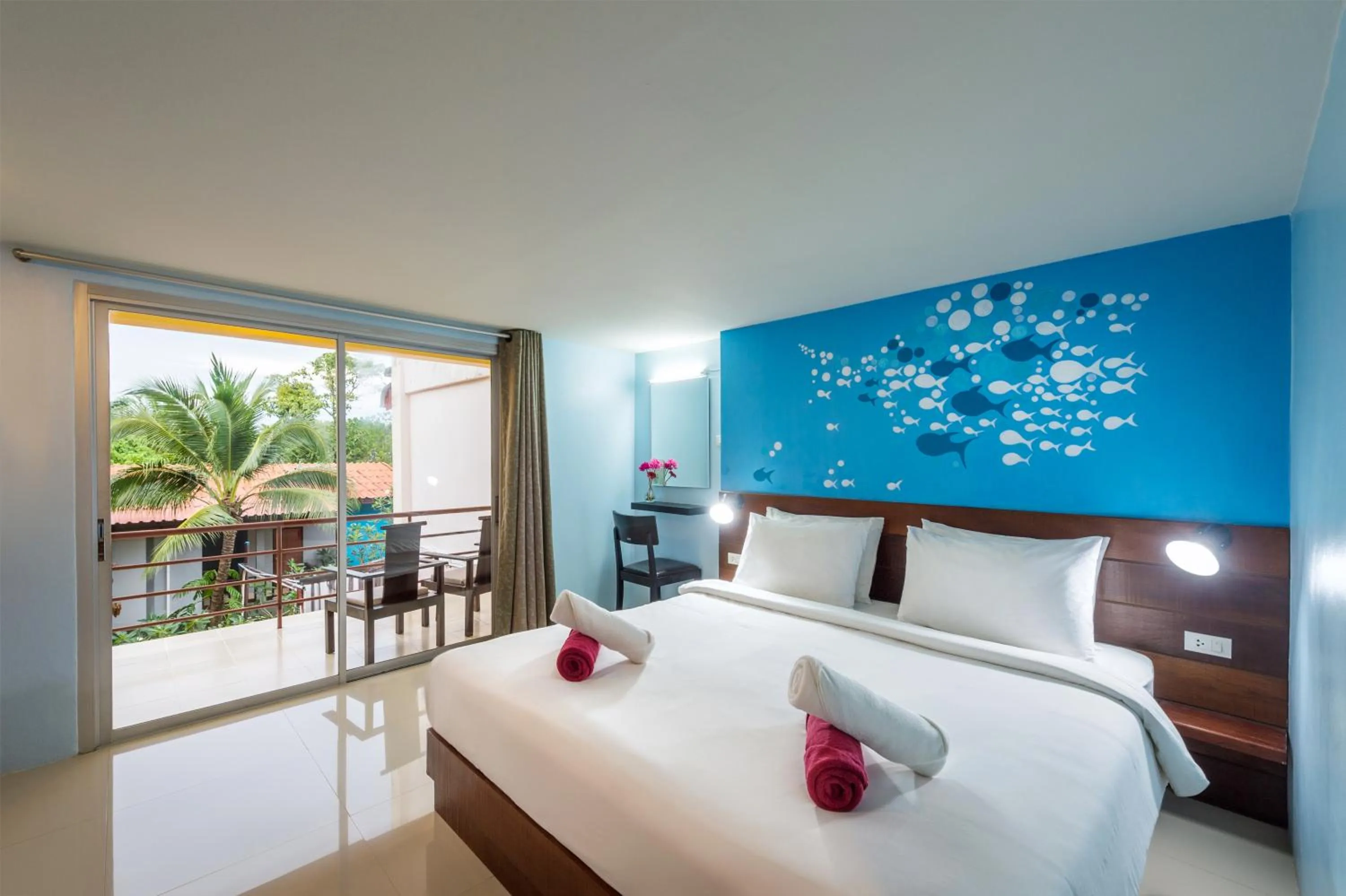 Bed in Lanta Thip House by Swiss-Belhotel