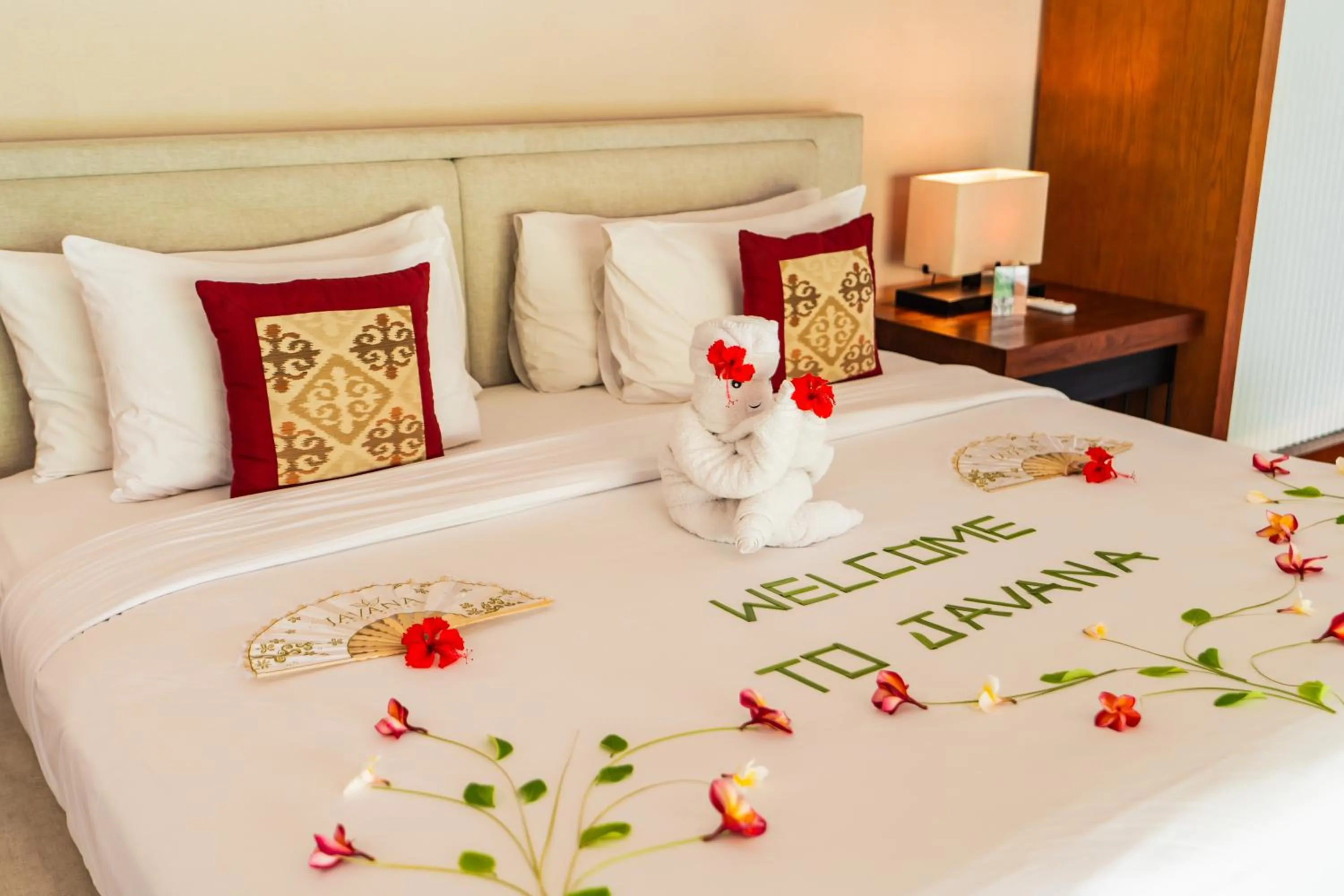 Bed in Javana Royal Villas