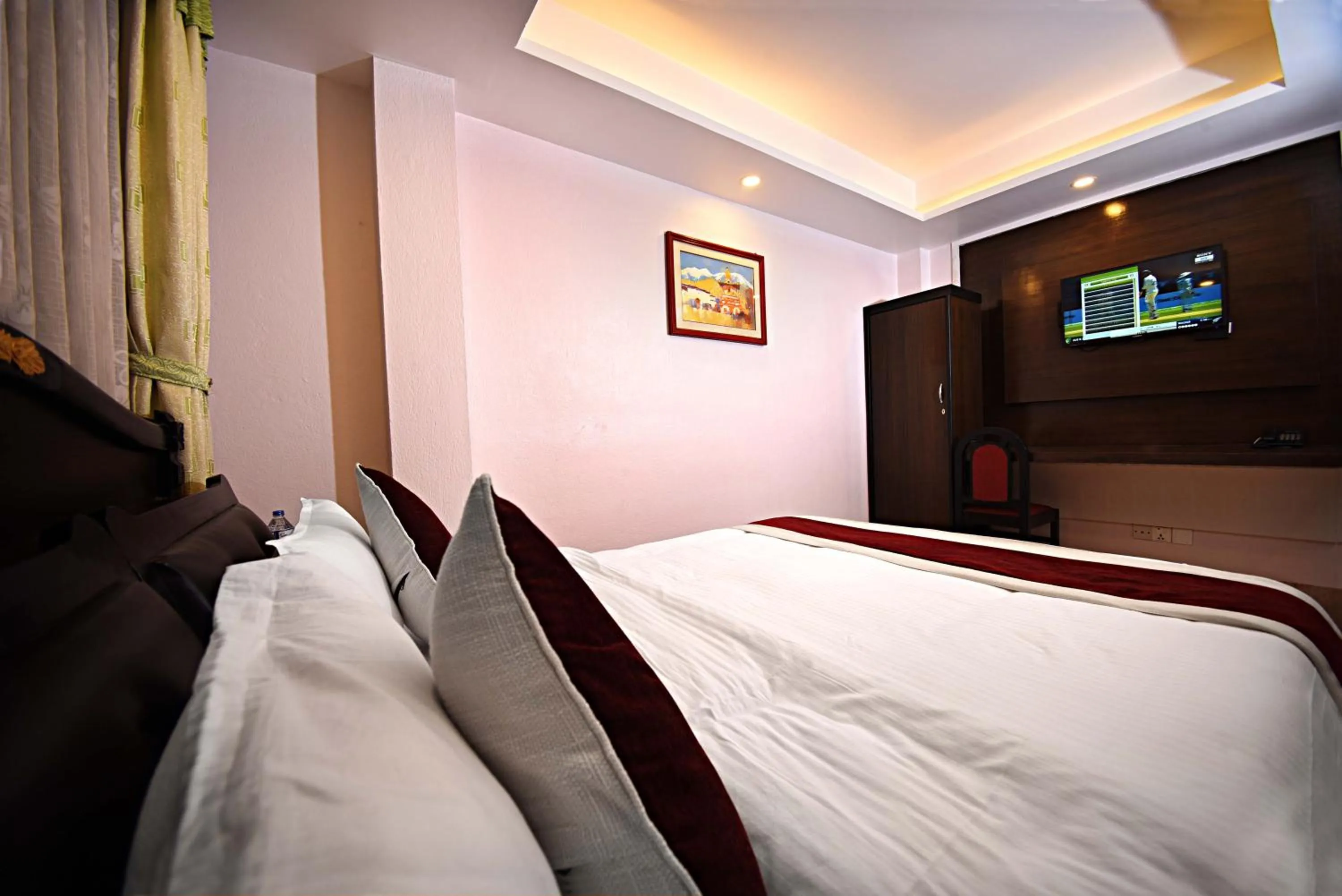 Bed in Greatwall International Hotel