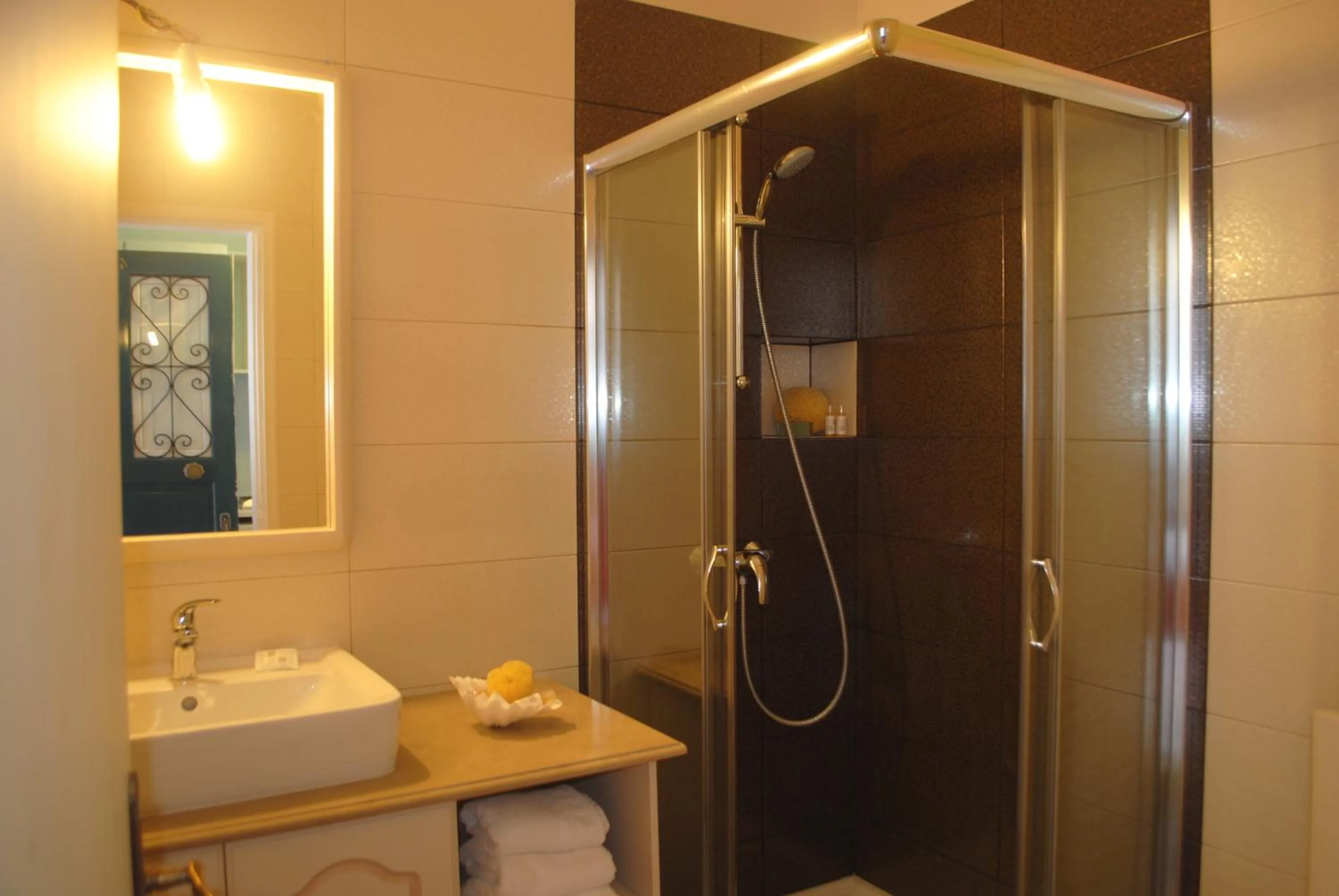 Bathroom in Apollonia Hotel