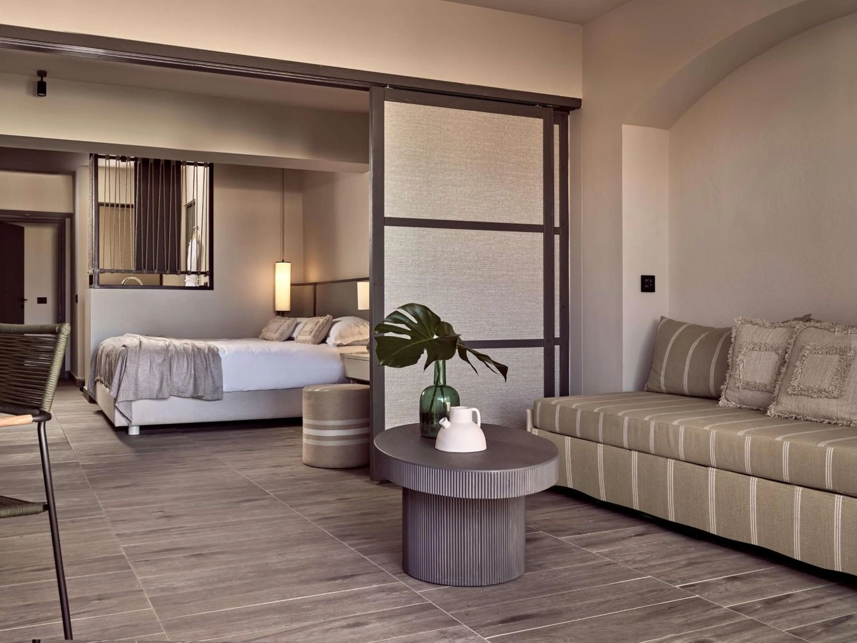 Living room, Bed in Numo Ierapetra Beach Resort Crete, Adults only, Curio Collection Hilton