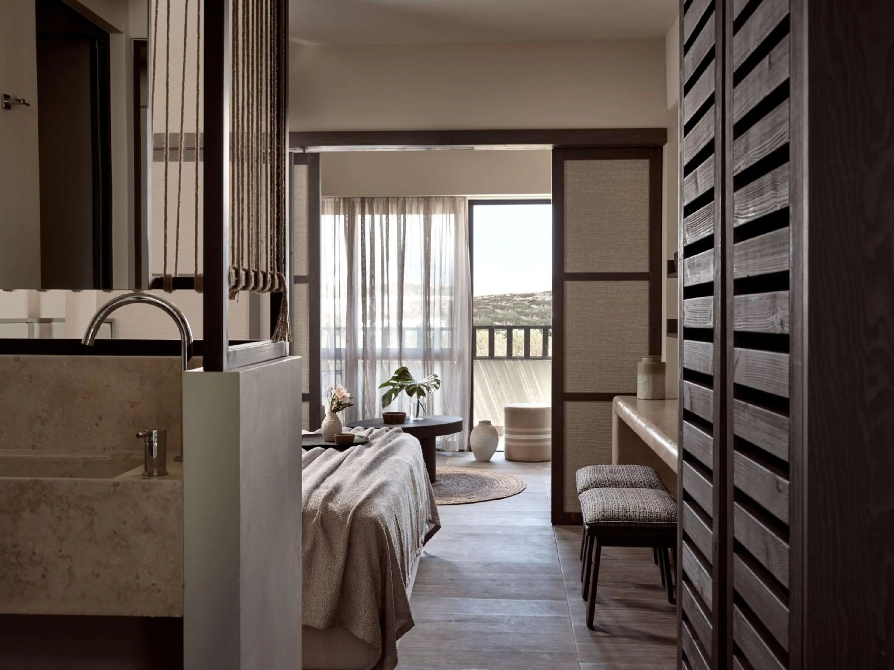 Bed in Numo Ierapetra Beach Resort Crete, Adults only, Curio Collection Hilton