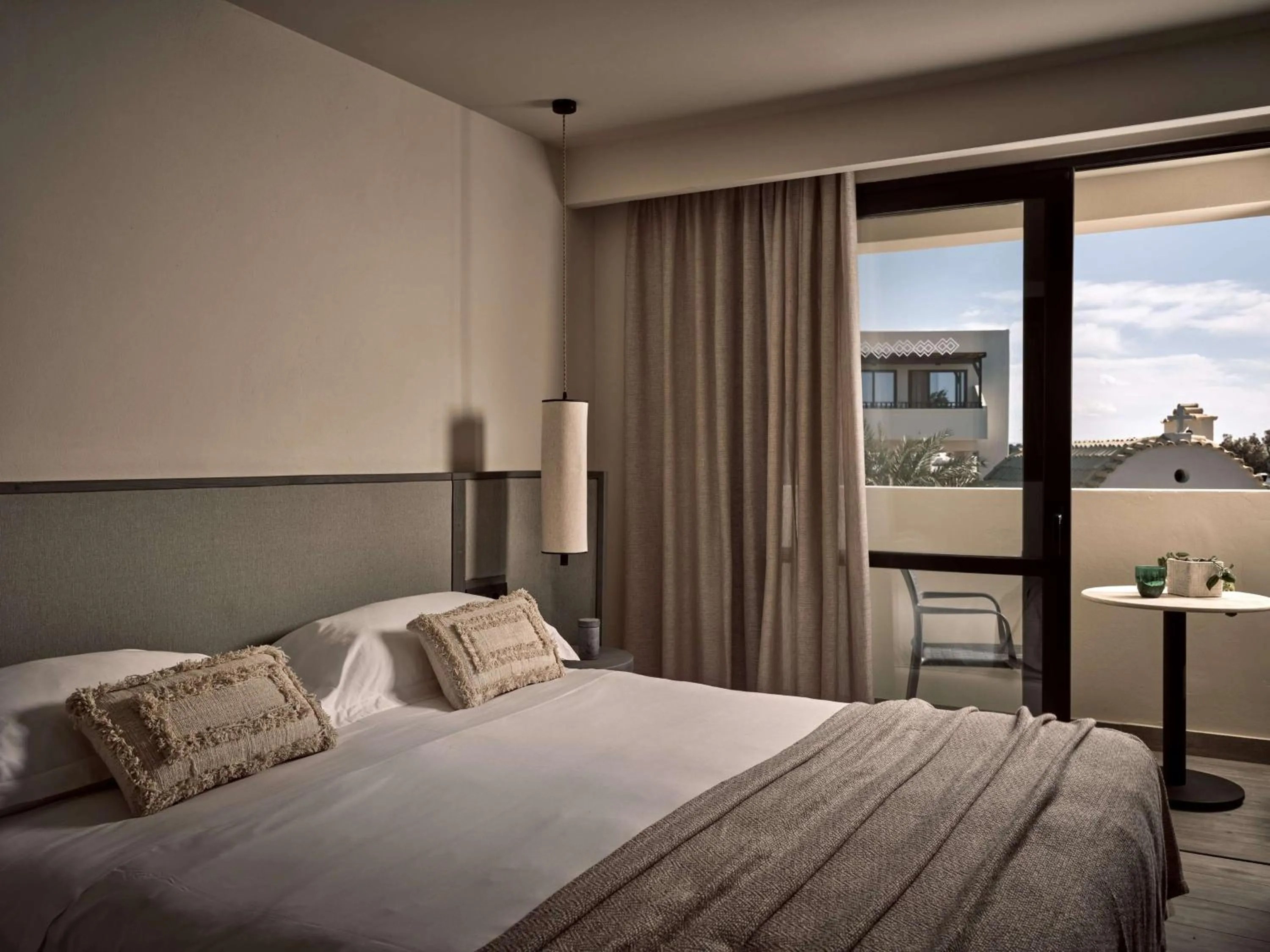Bed in Numo Ierapetra Beach Resort Crete, Adults only, Curio Collection Hilton