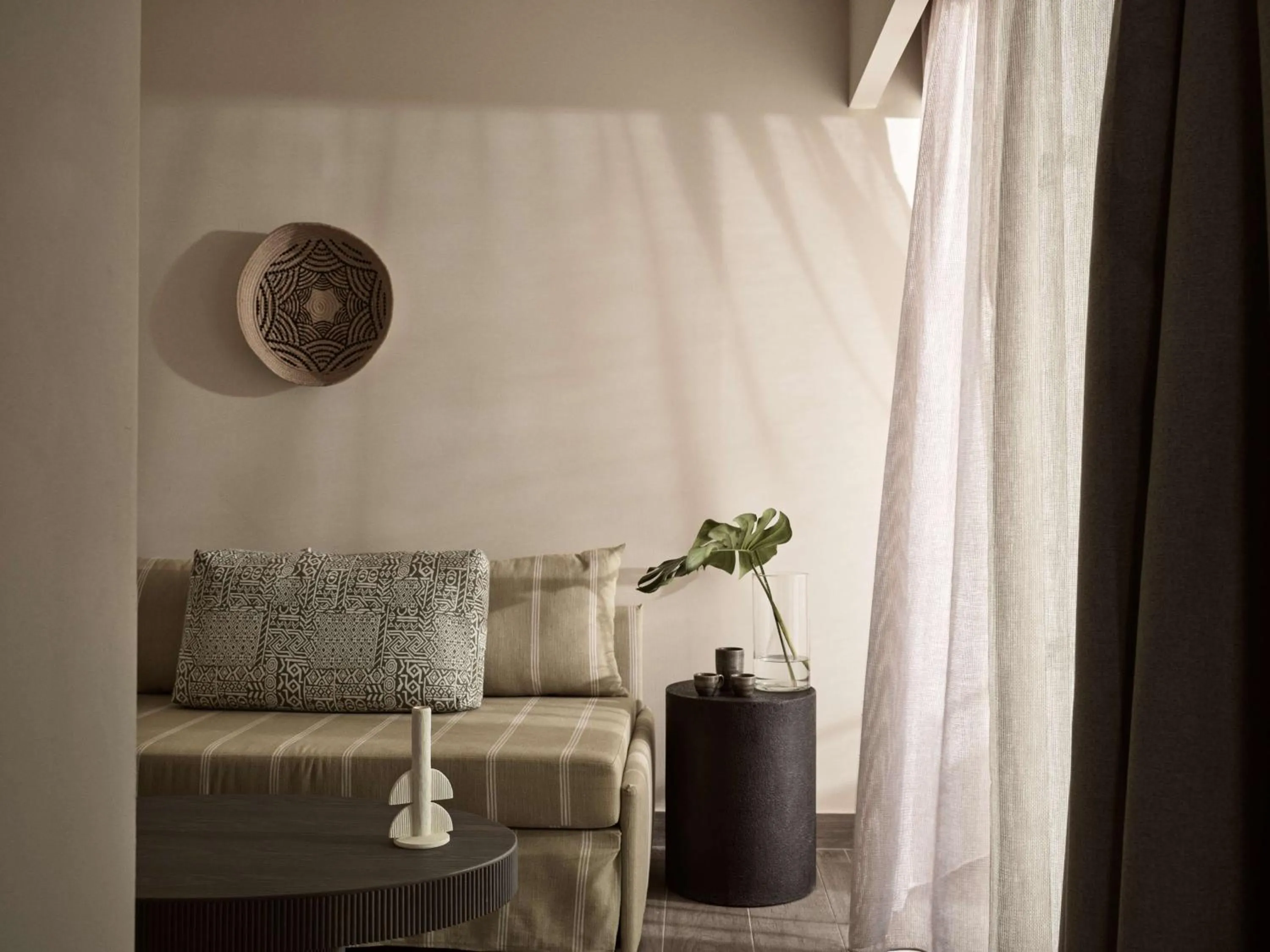 Living room in Numo Ierapetra Beach Resort Crete, Adults only, Curio Collection Hilton