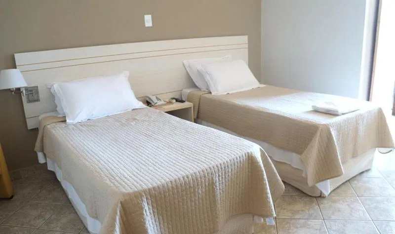 Bed in Manhuaçu Center Hotel