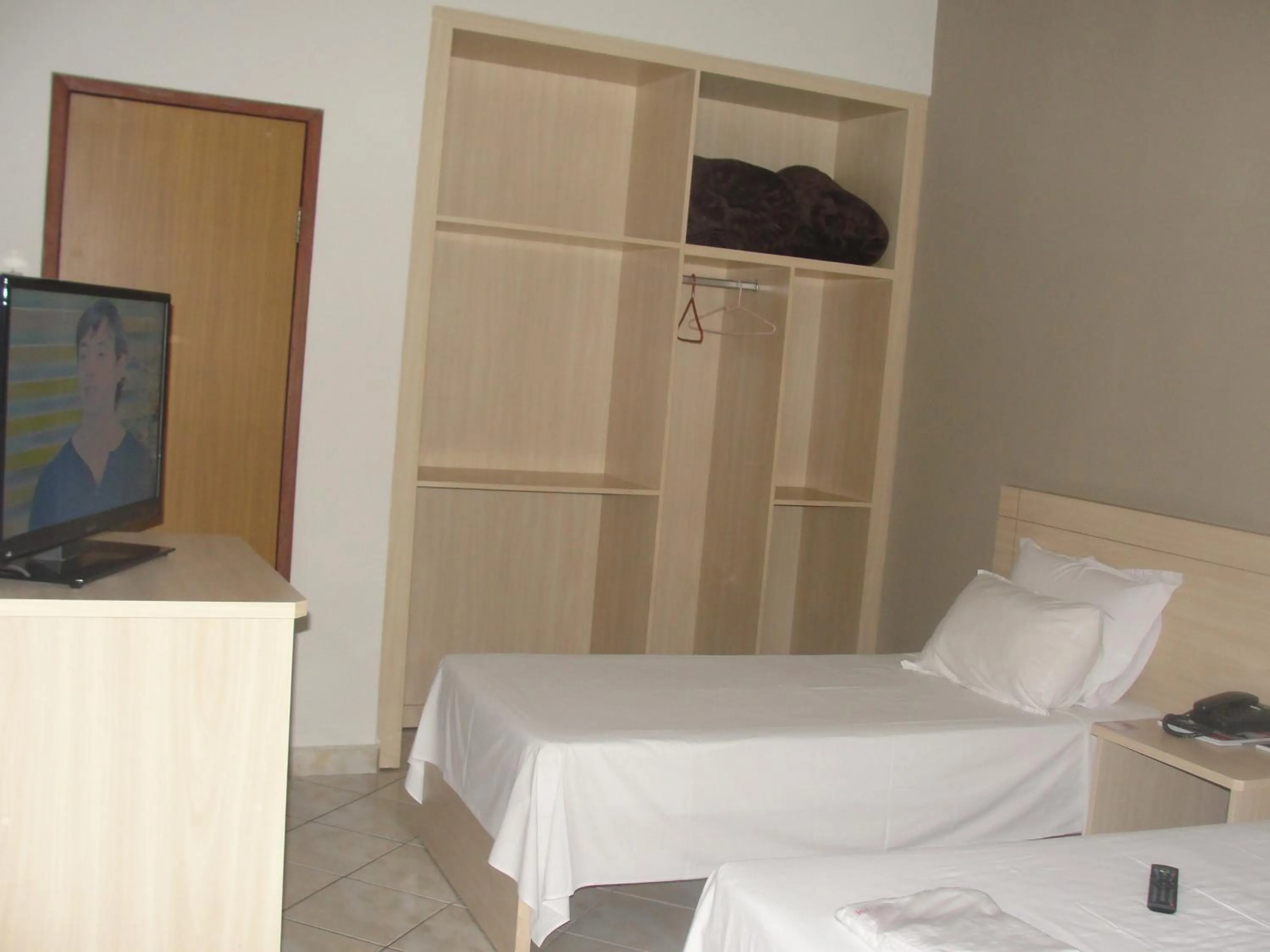 Bed in Manhuaçu Center Hotel