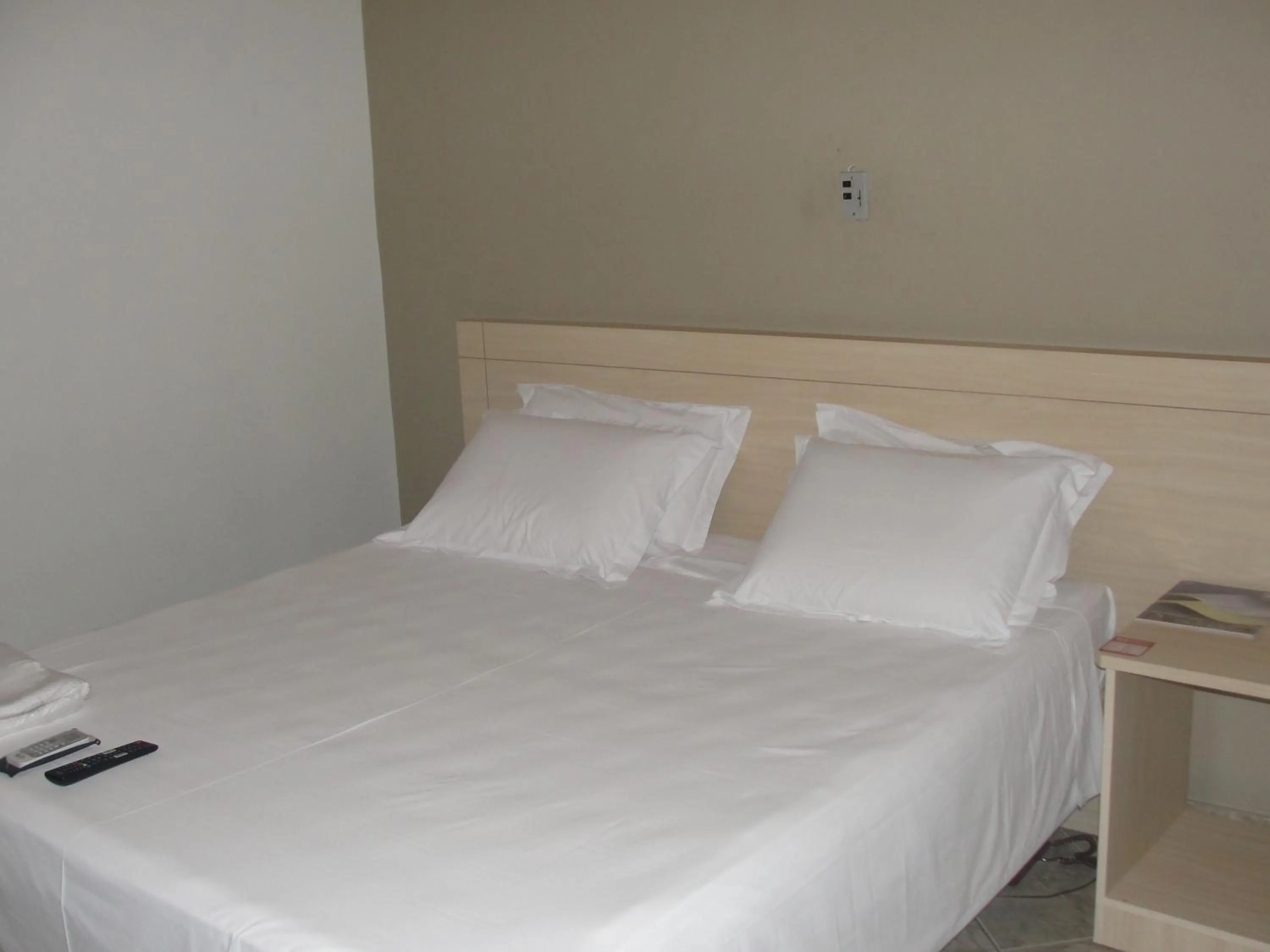 Bed in Manhuaçu Center Hotel