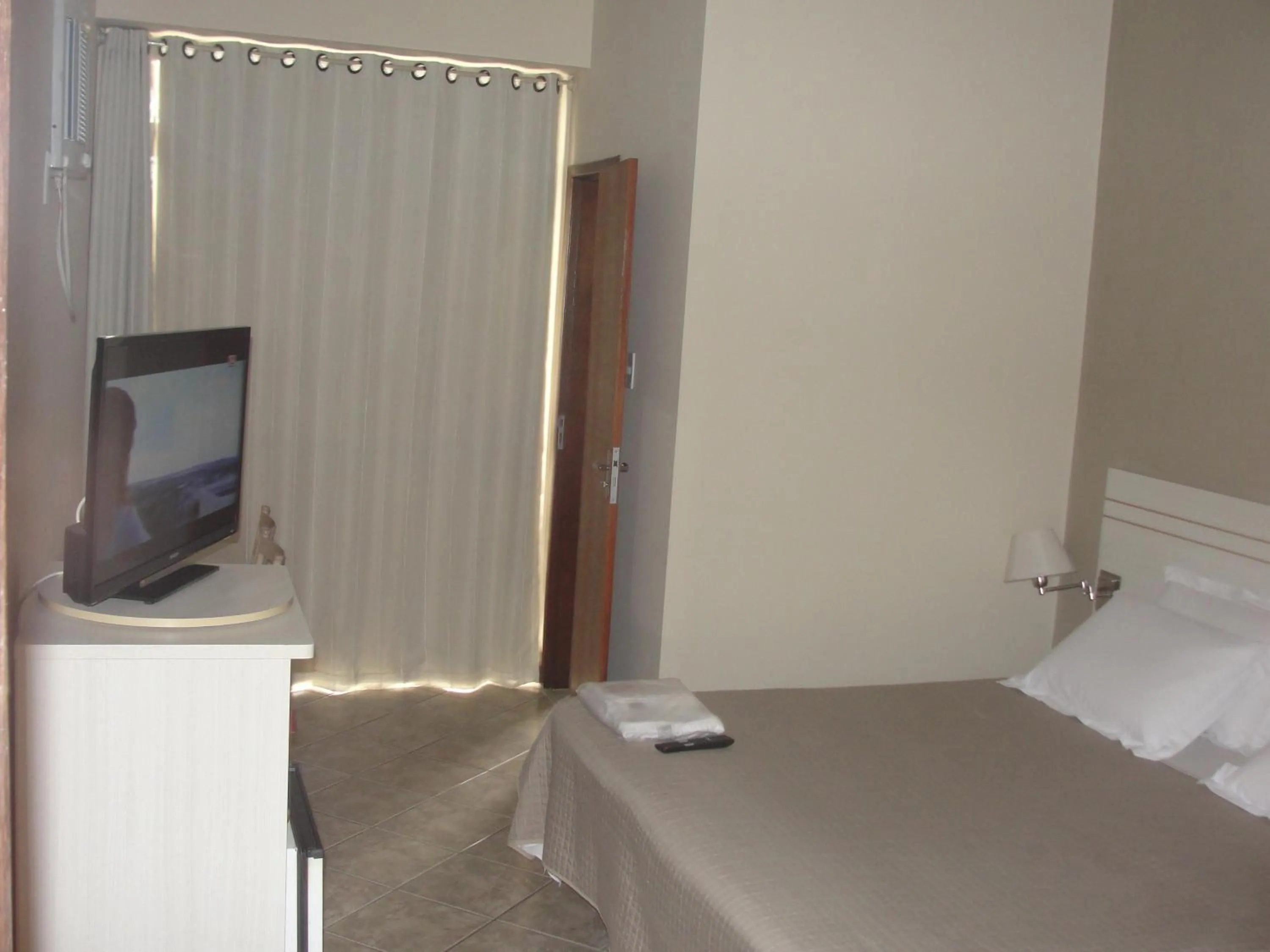 Bed in Manhuaçu Center Hotel