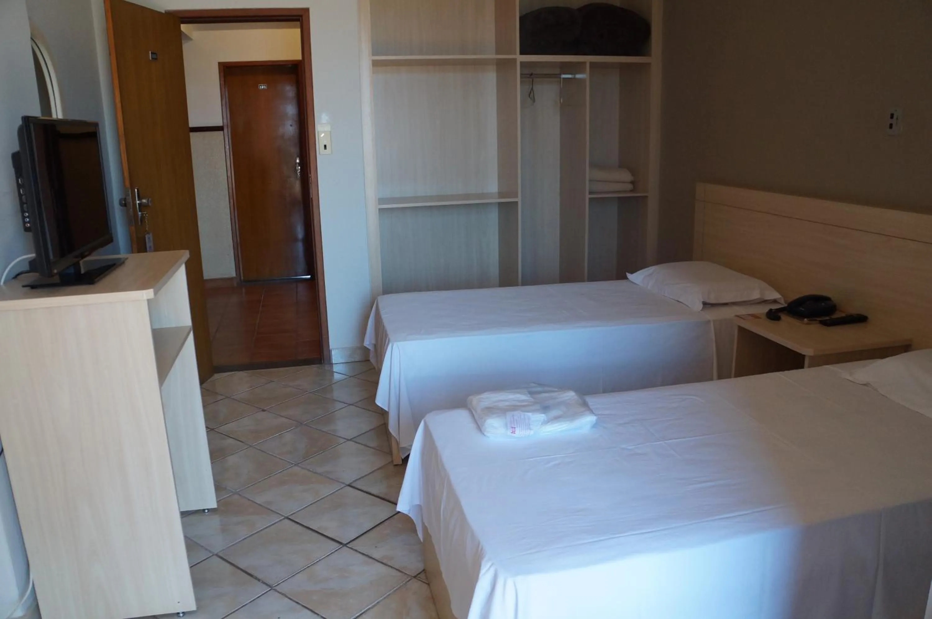 Bed in Manhuaçu Center Hotel