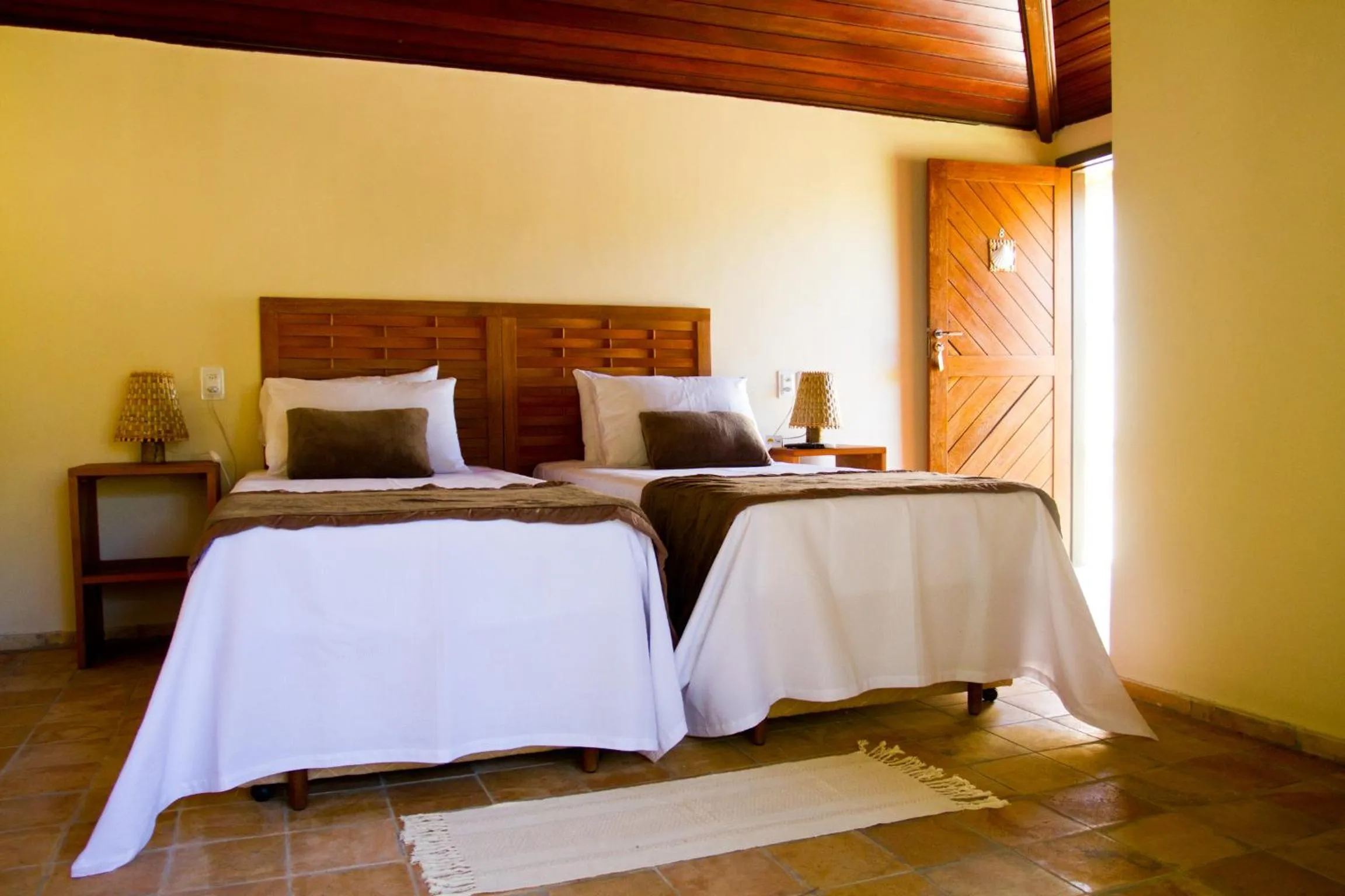 Bed in Pousada Berro do Jeguy