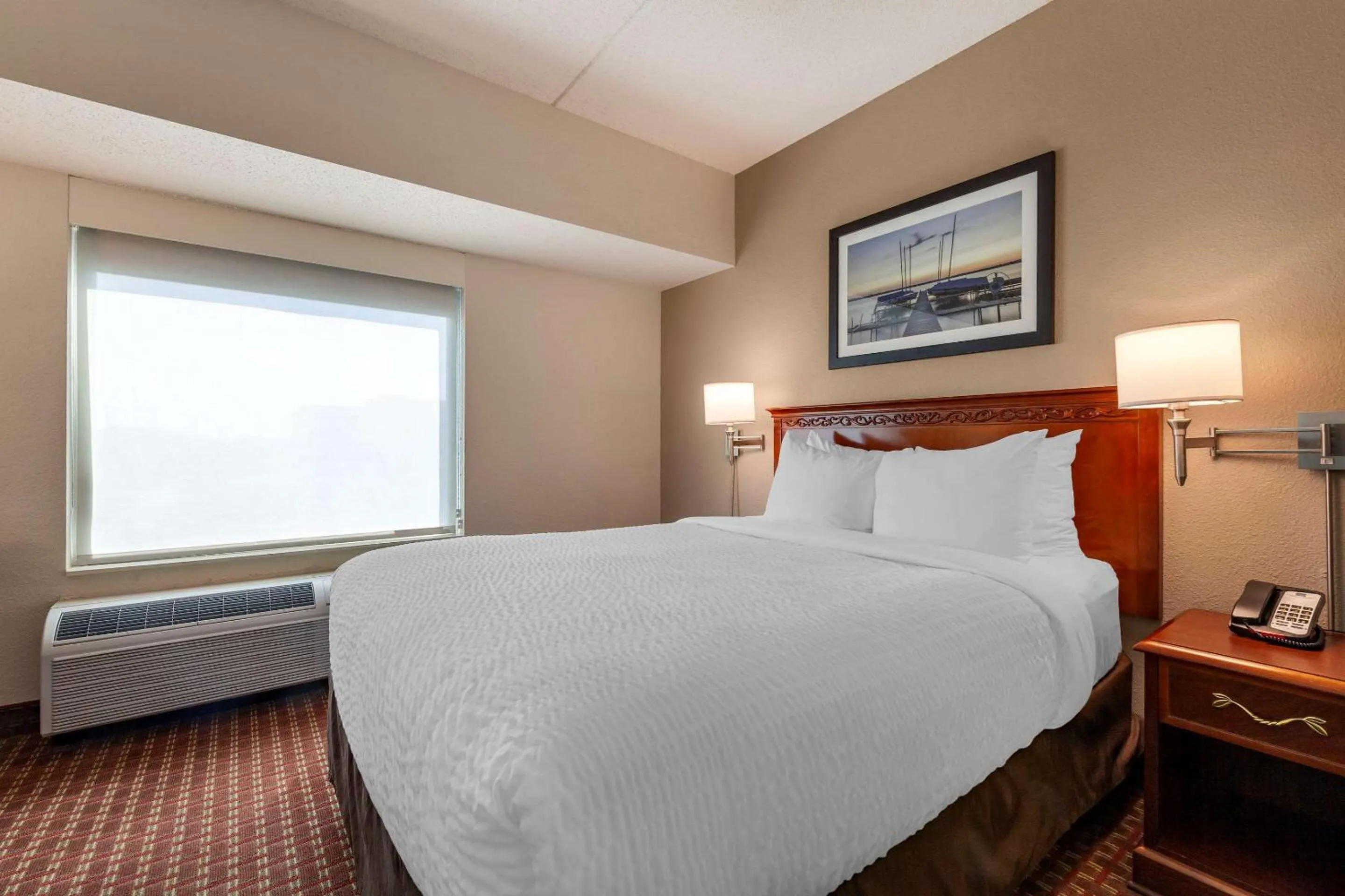 Bedroom in Clarion Suites at The Alliant Energy Center