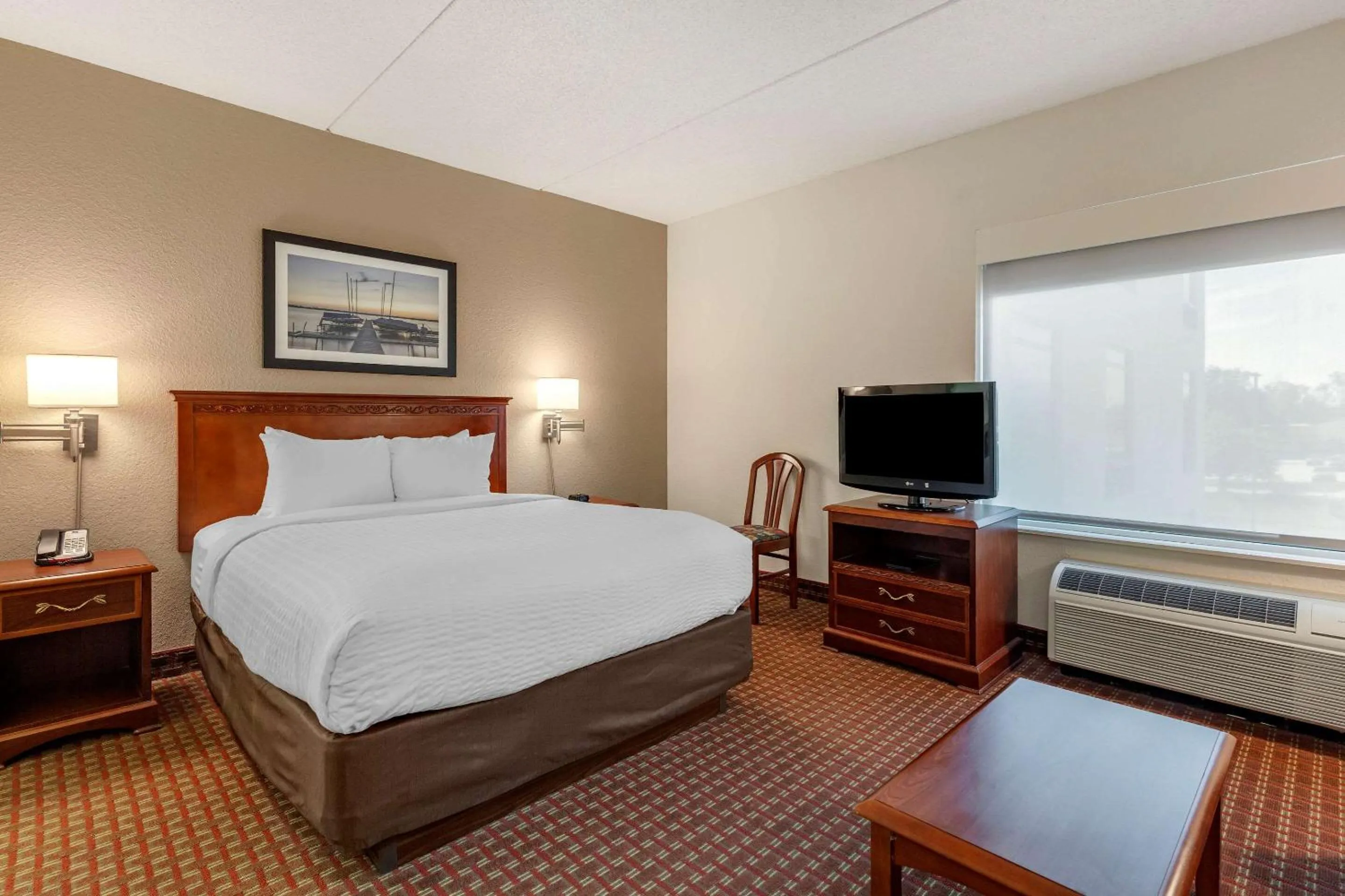 Bedroom in Clarion Suites at The Alliant Energy Center