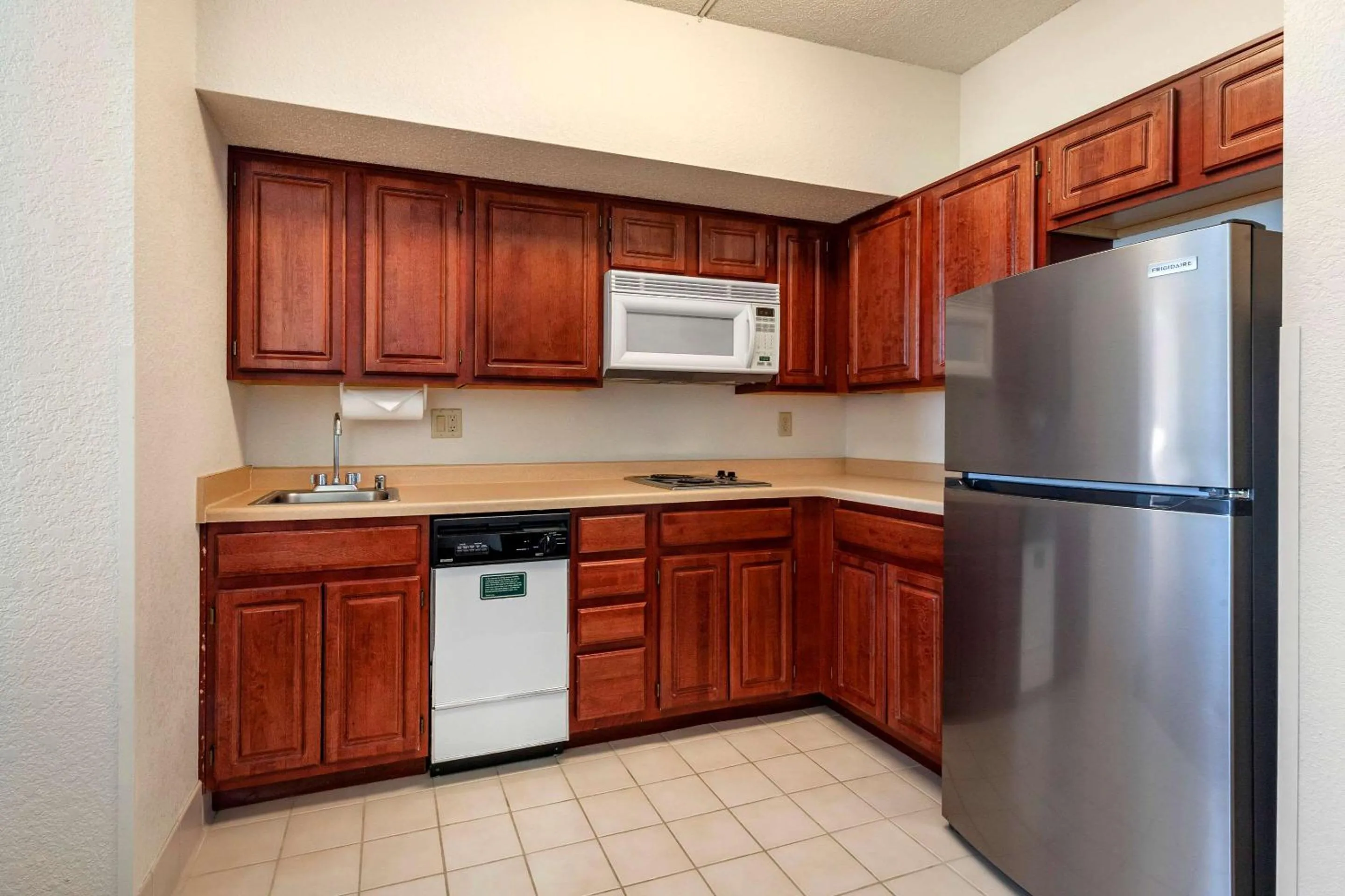 Bedroom in Clarion Suites at The Alliant Energy Center