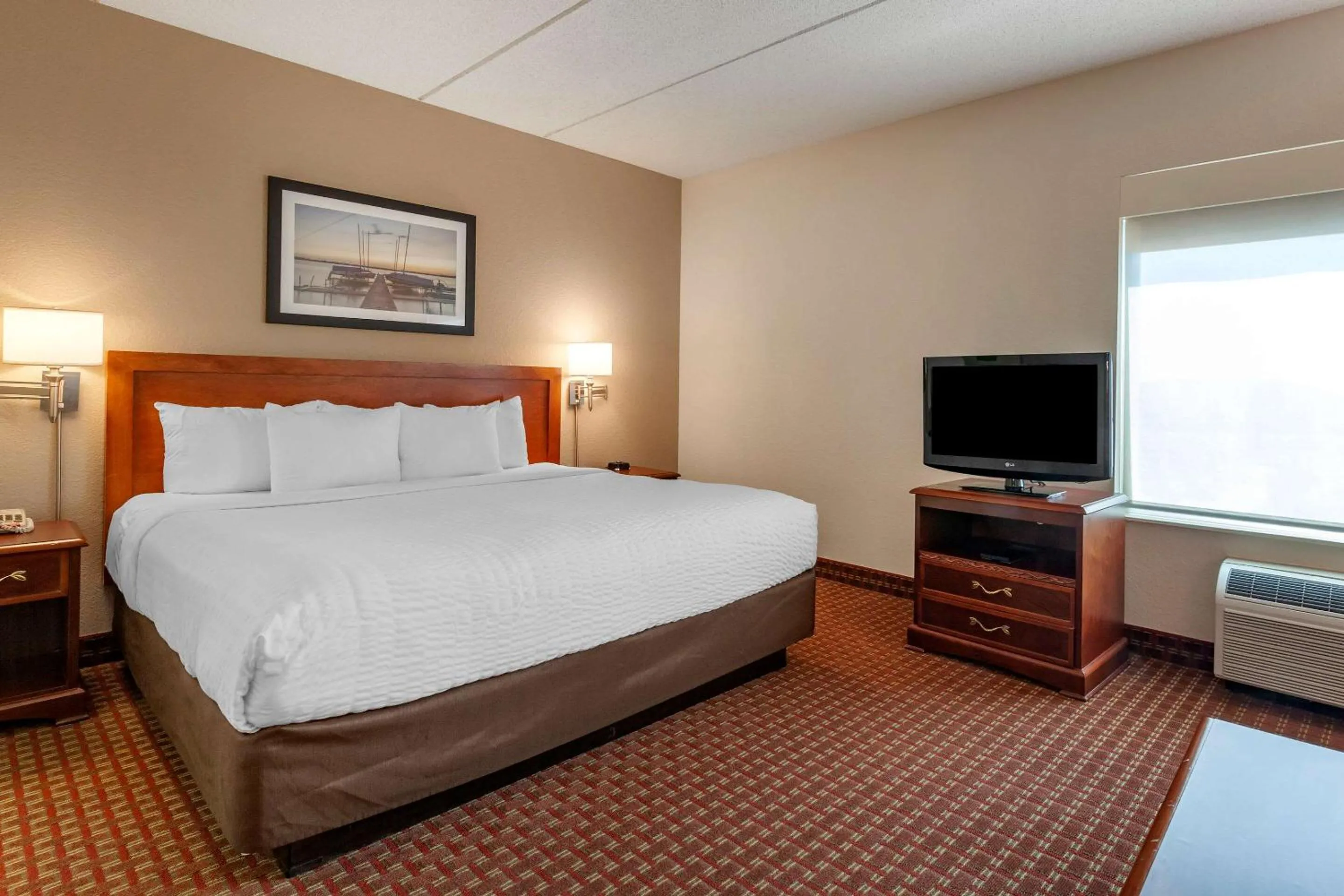 Bedroom in Clarion Suites at The Alliant Energy Center