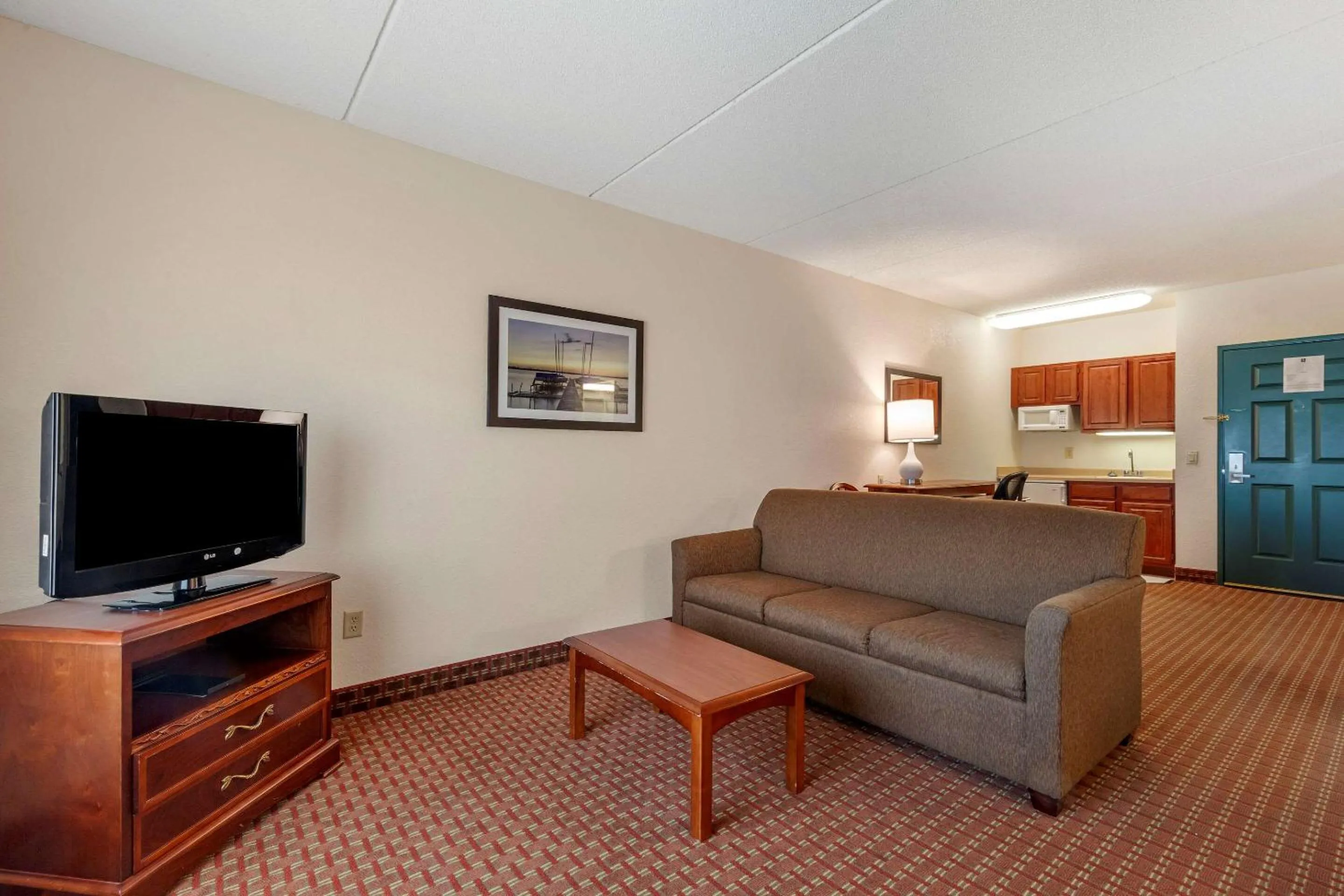 Bedroom in Clarion Suites at The Alliant Energy Center