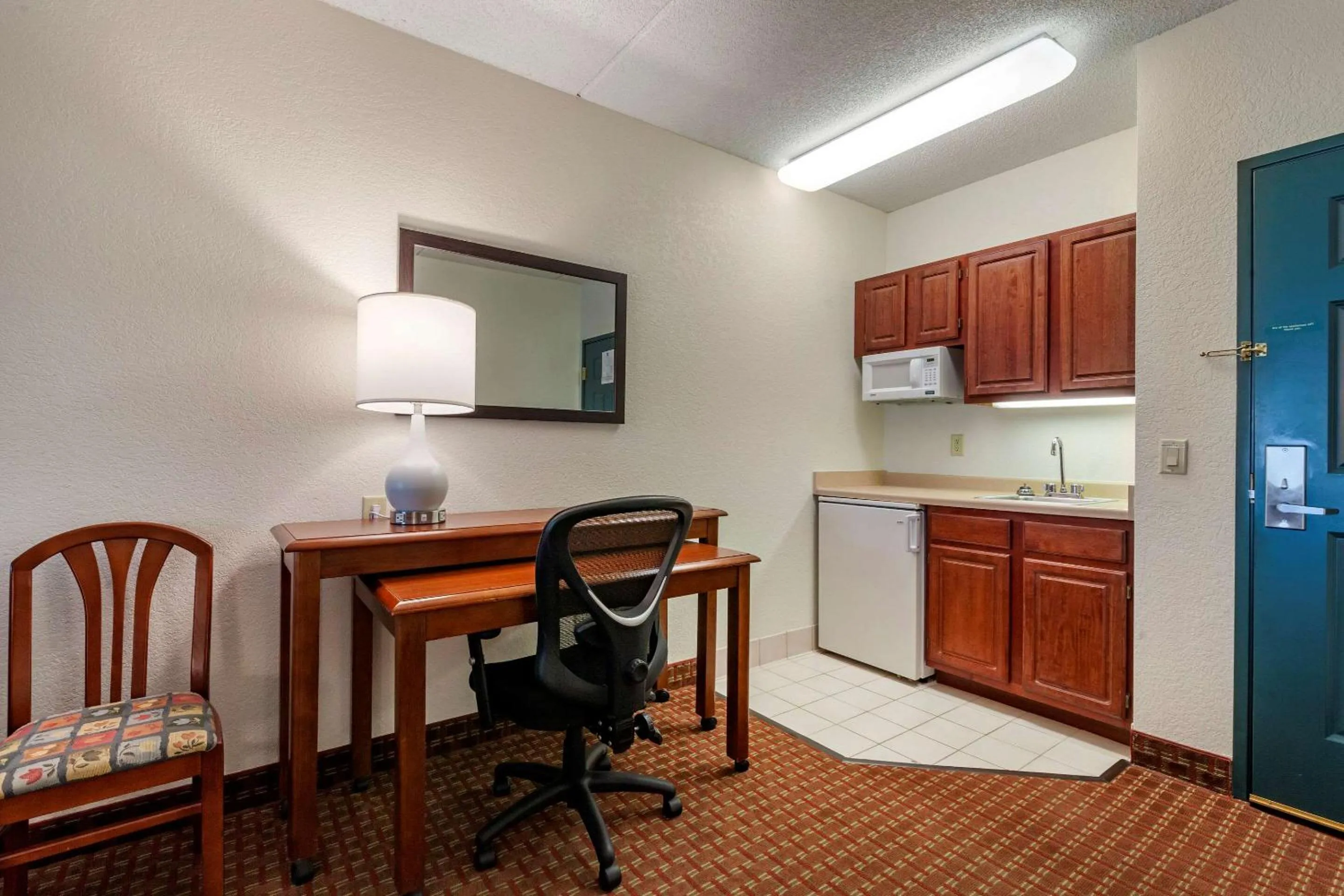 Bedroom in Clarion Suites at The Alliant Energy Center