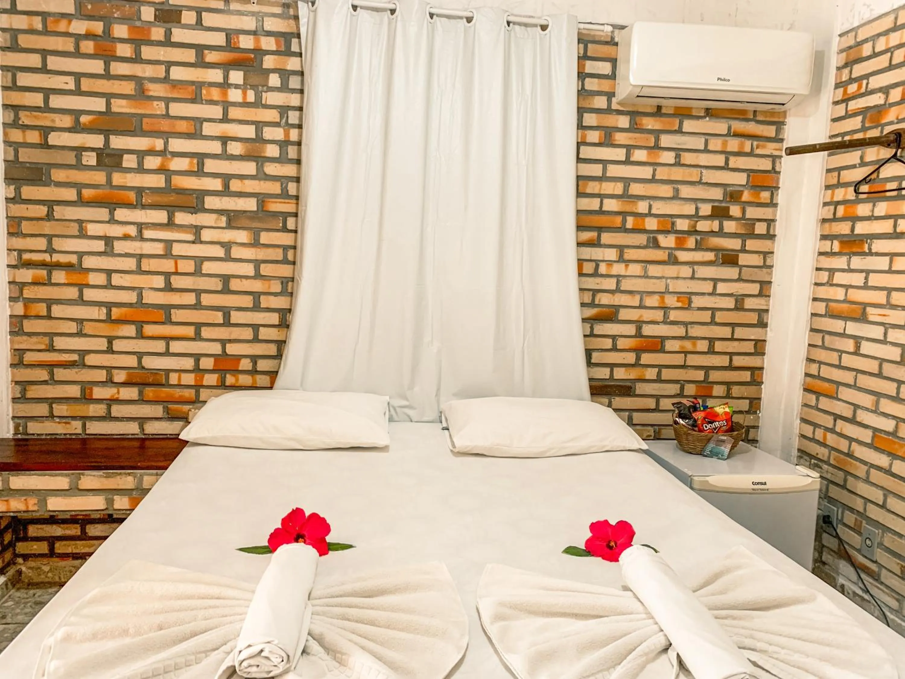 Bed in Pousada La Goduria