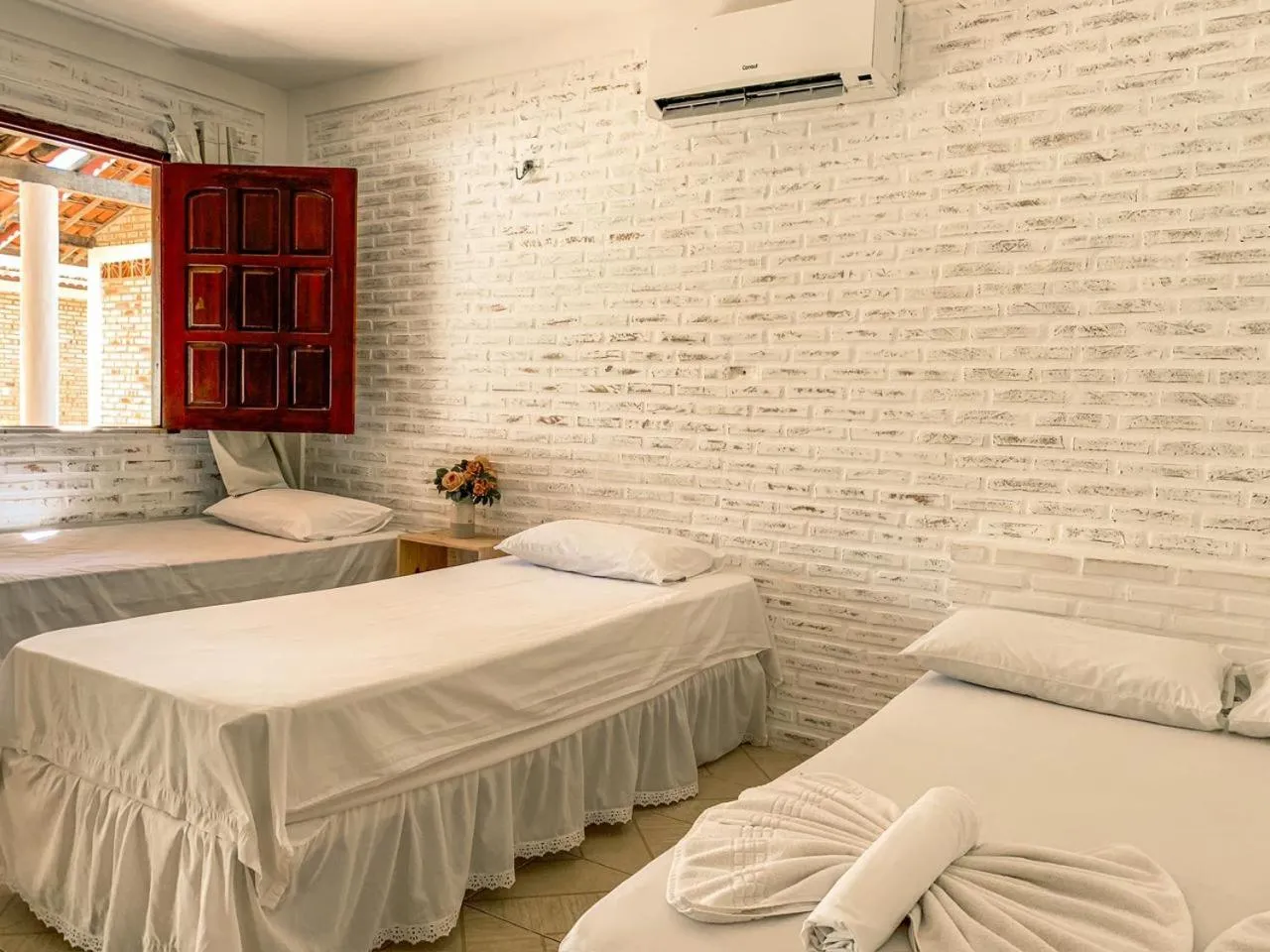 Bed in Pousada La Goduria