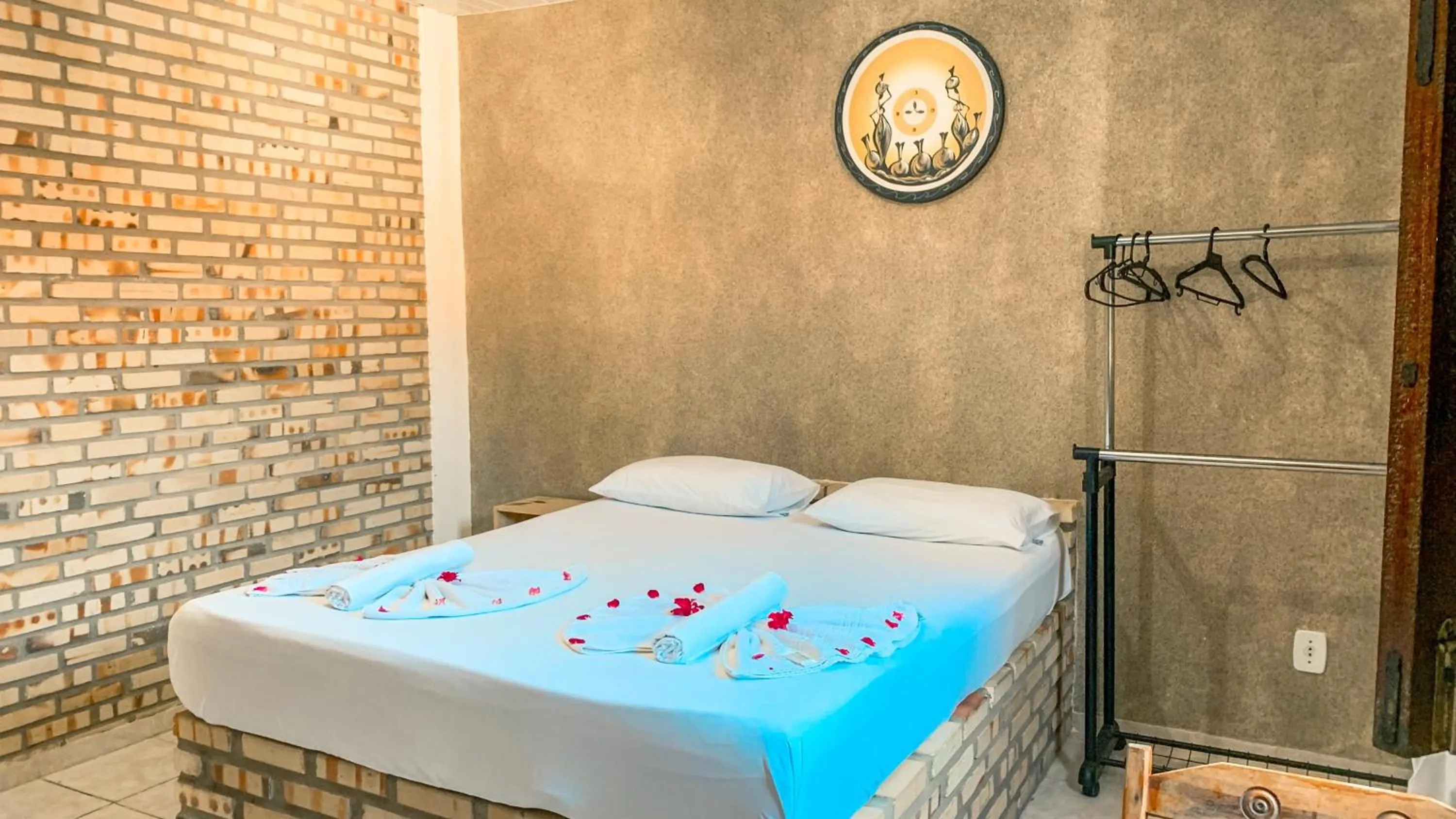 Bed in Pousada La Goduria