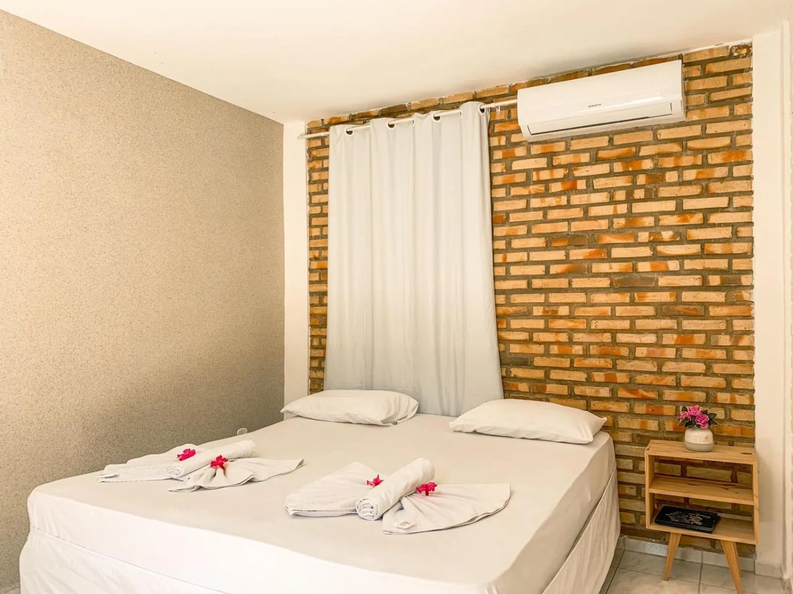 Bed in Pousada La Goduria