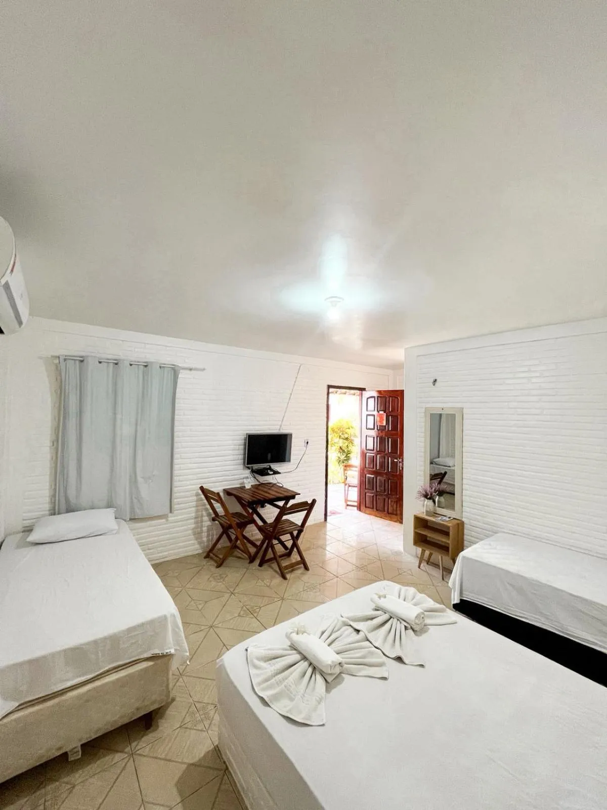 Bed in Pousada La Goduria