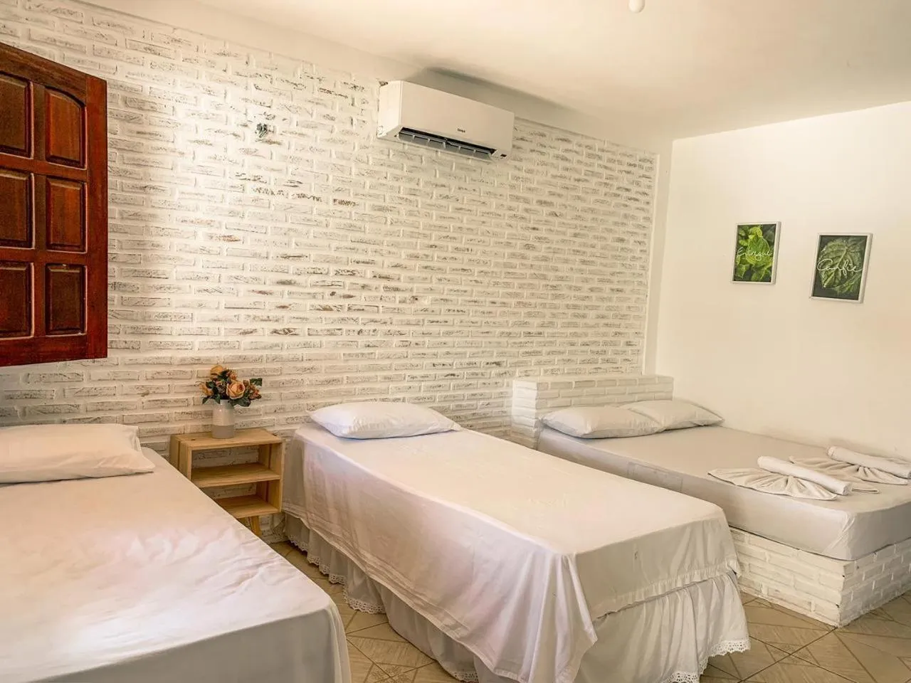 Bed in Pousada La Goduria