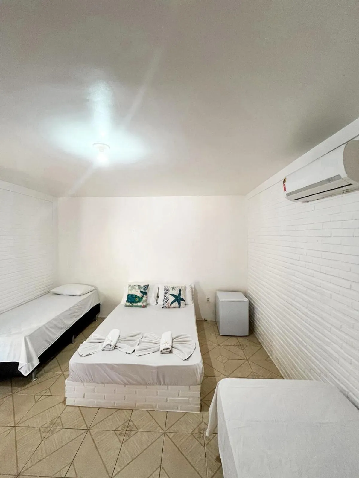 Bed in Pousada La Goduria