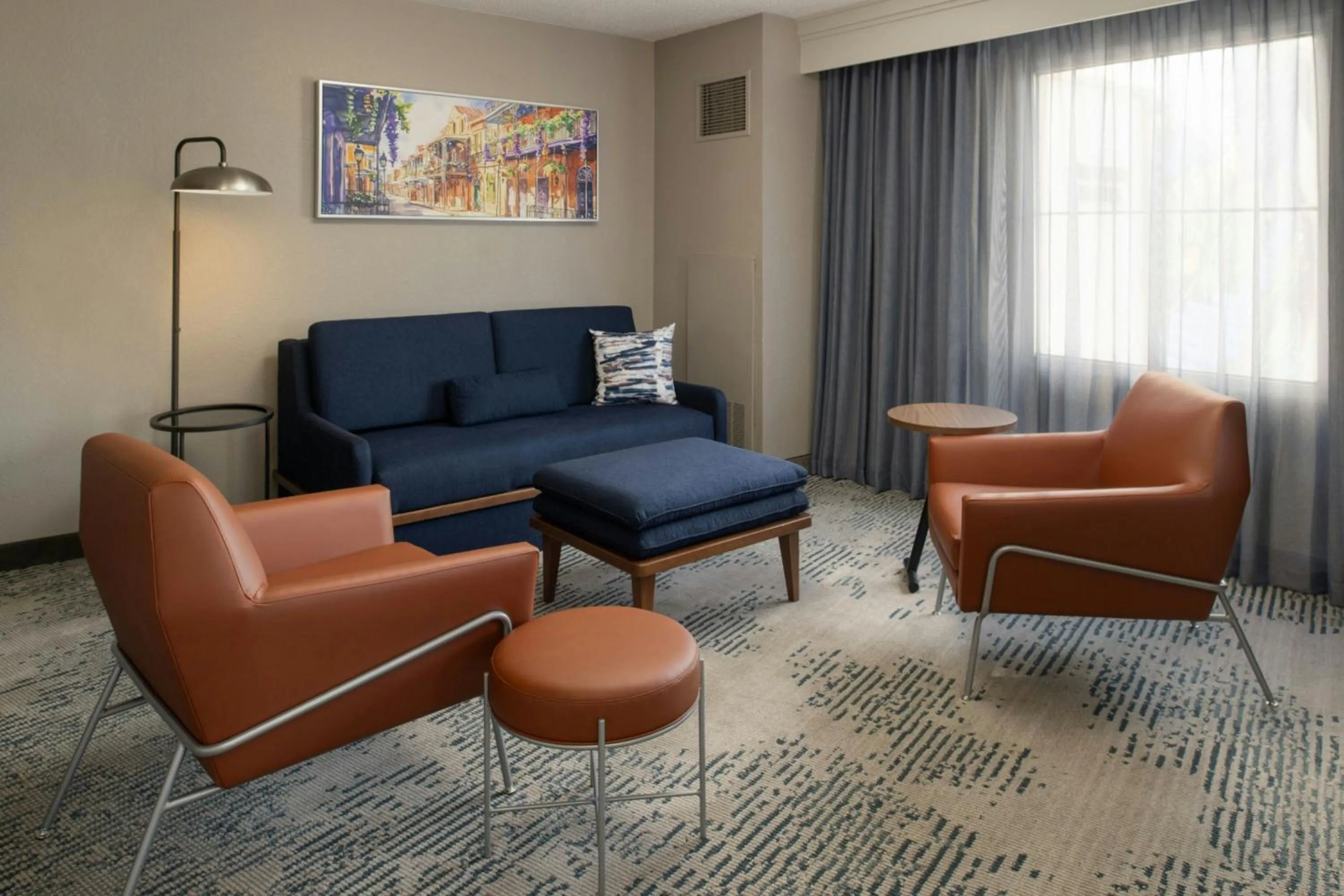 Living room in Courtyard by Marriott New Orleans Warehouse Arts District