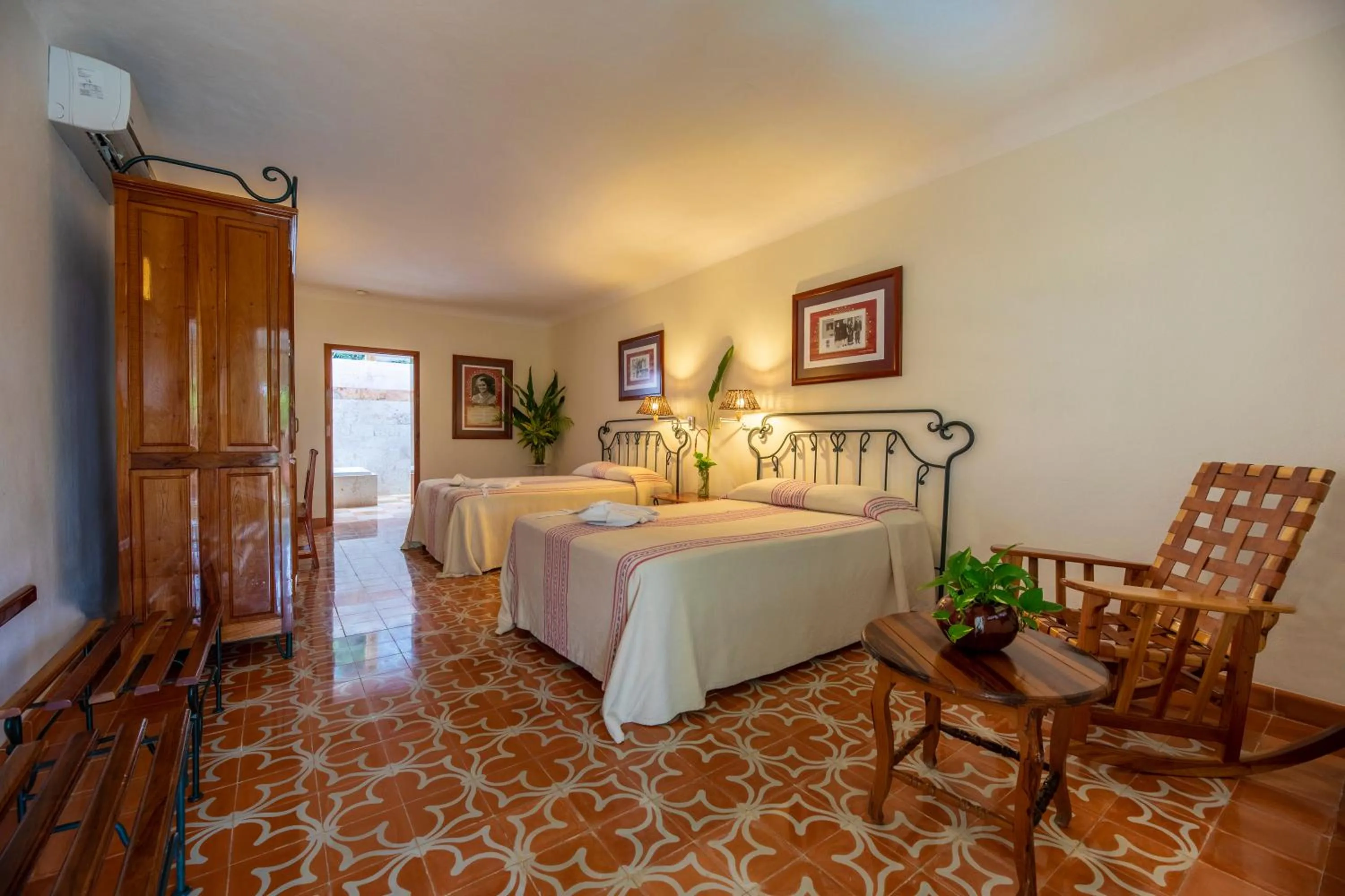 Photo of the whole room, Bed in Hacienda Uxmal Plantation & Museum
