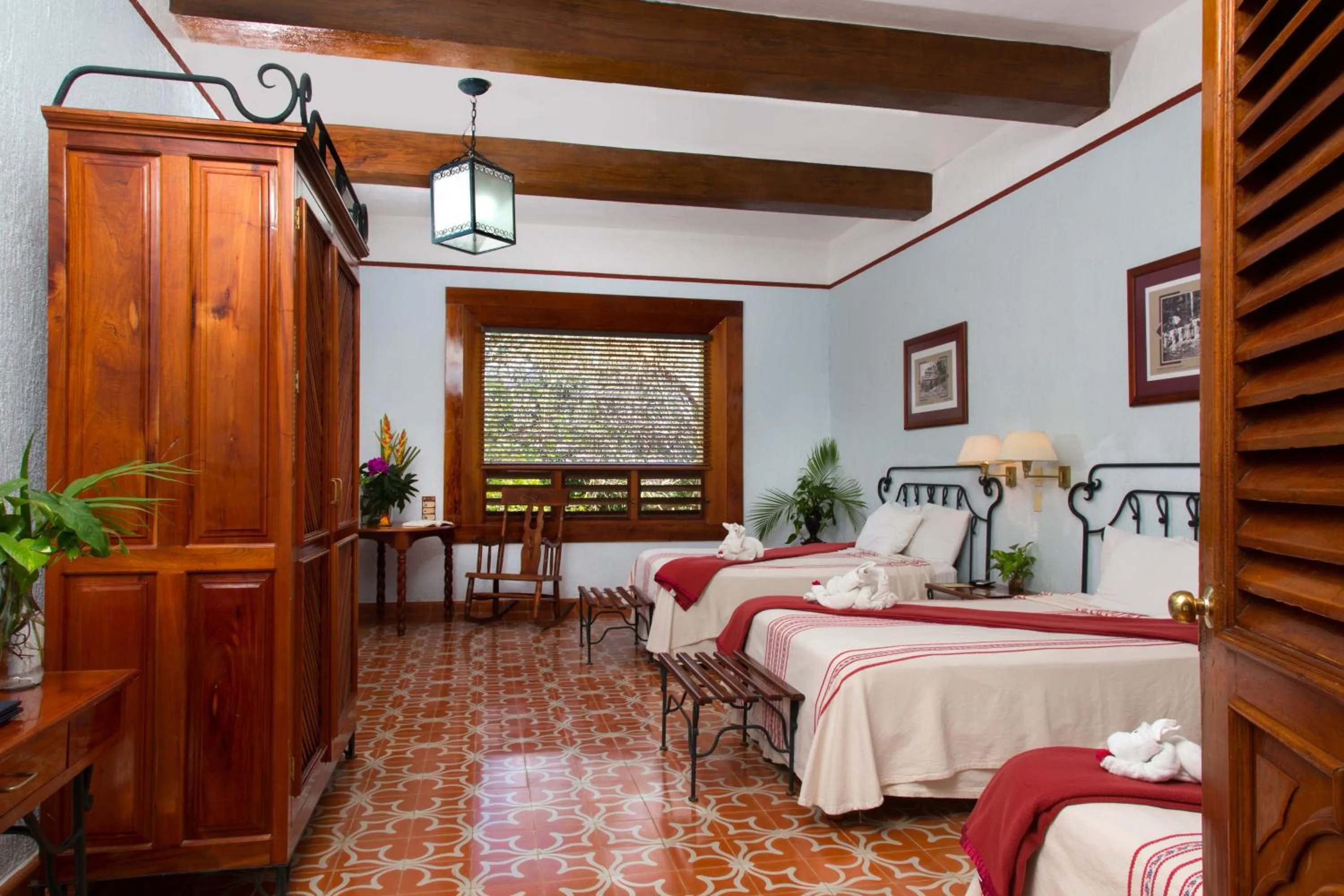 Photo of the whole room, Bed in Hacienda Uxmal Plantation & Museum