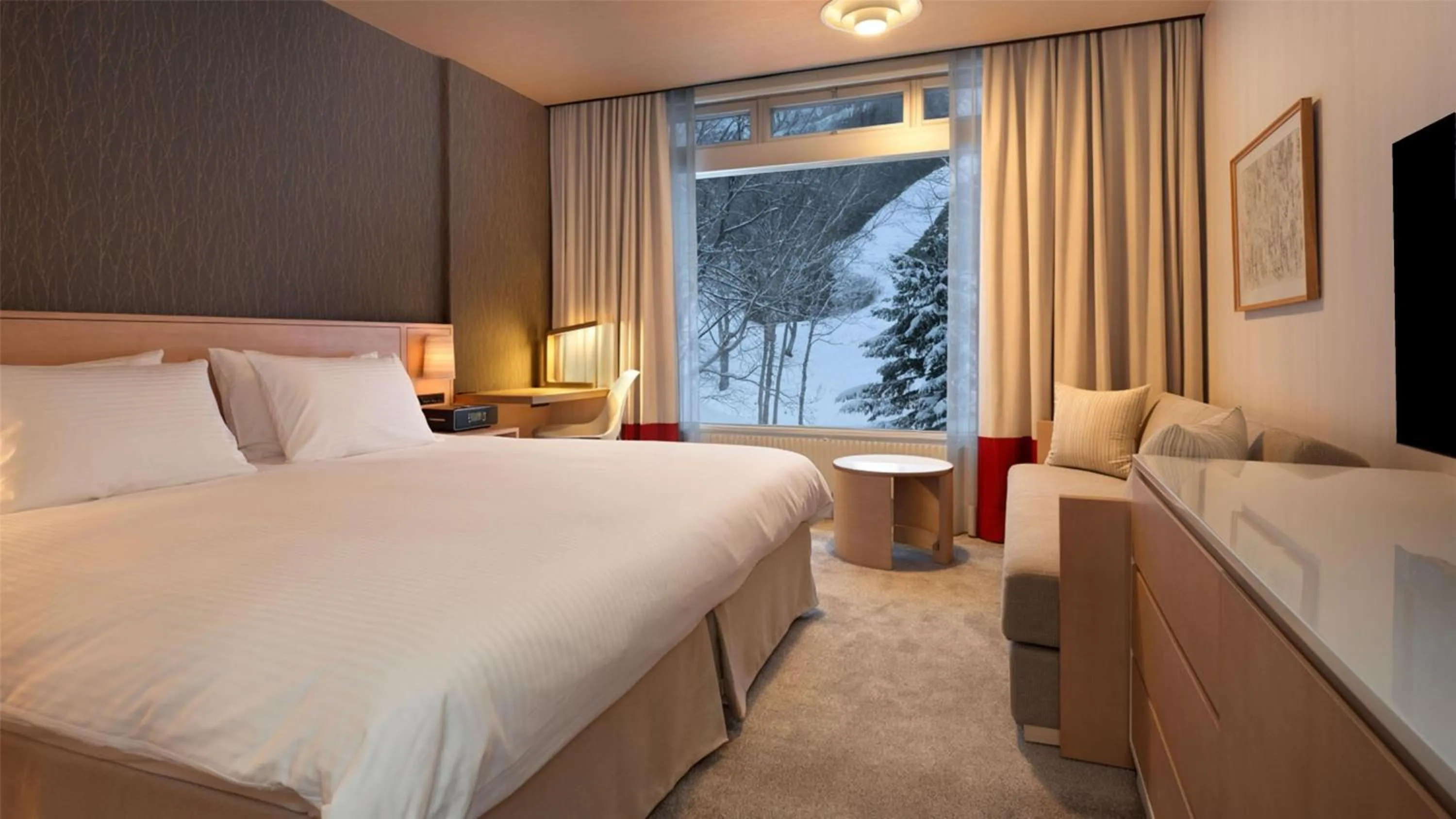 Bed in The Green Leaf Niseko Village, Tapestry Collection by Hilton