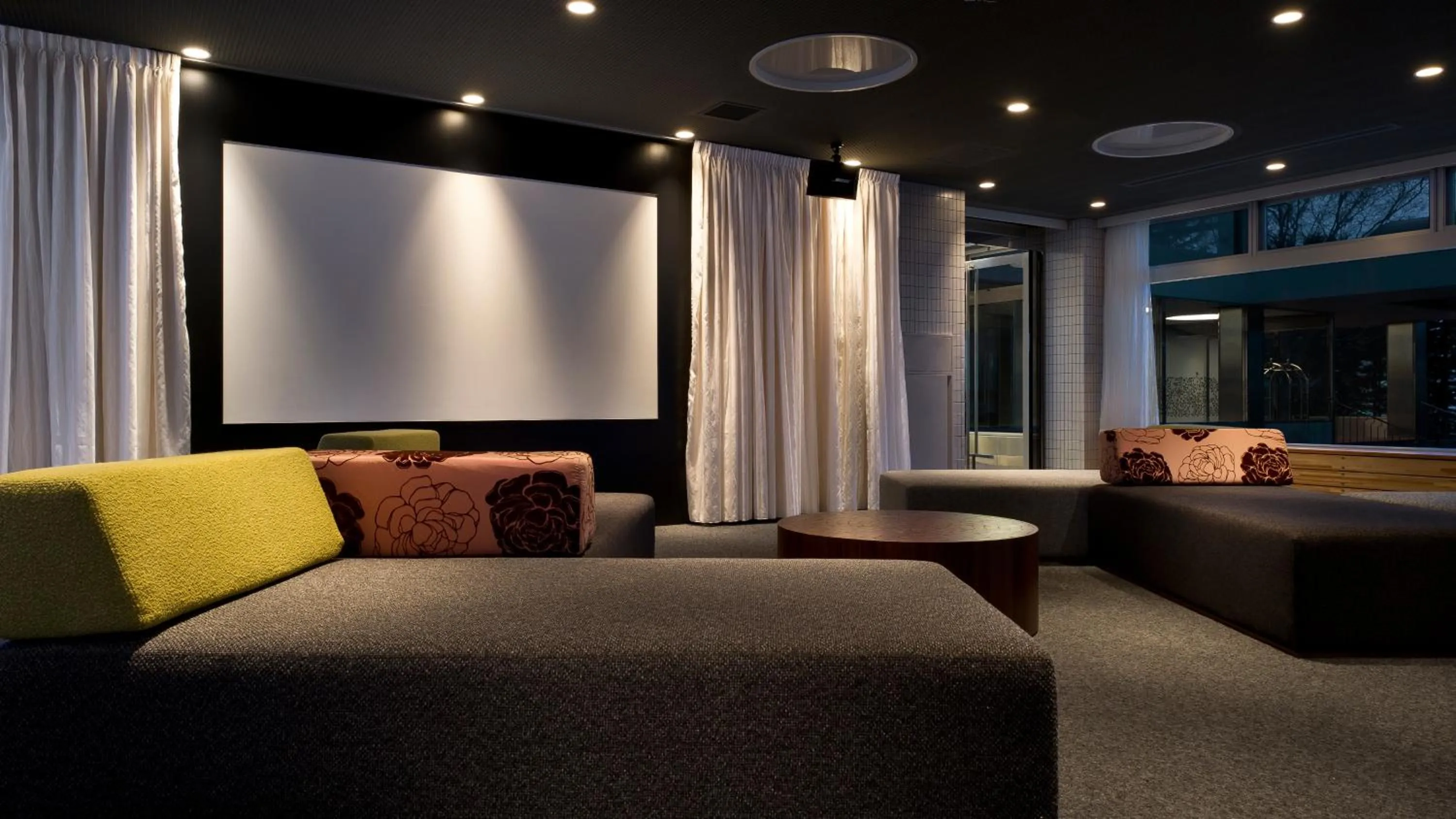 Communal lounge/ TV room in The Green Leaf Niseko Village, Tapestry Collection by Hilton