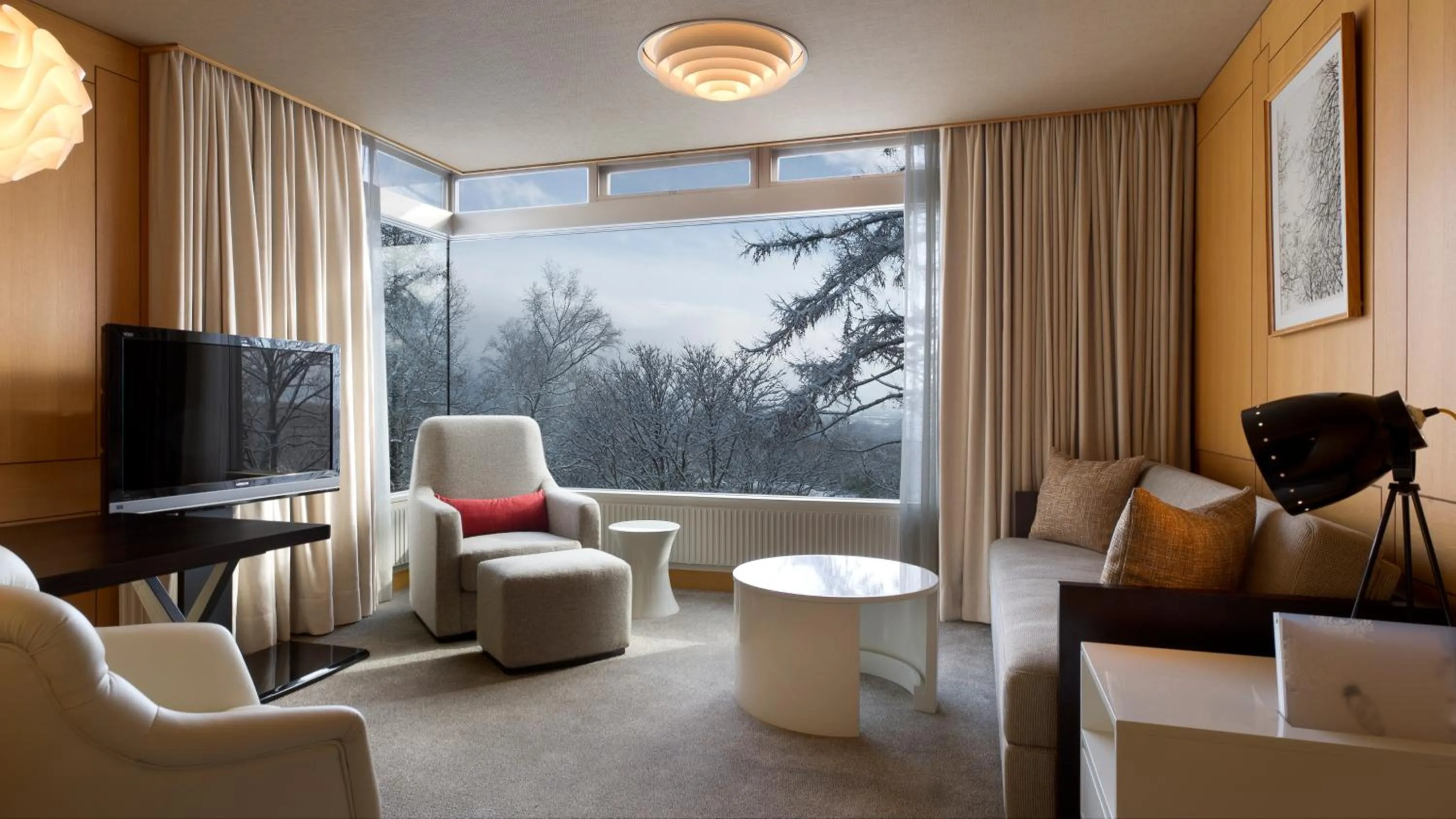 Seating area in The Green Leaf Niseko Village, Tapestry Collection by Hilton