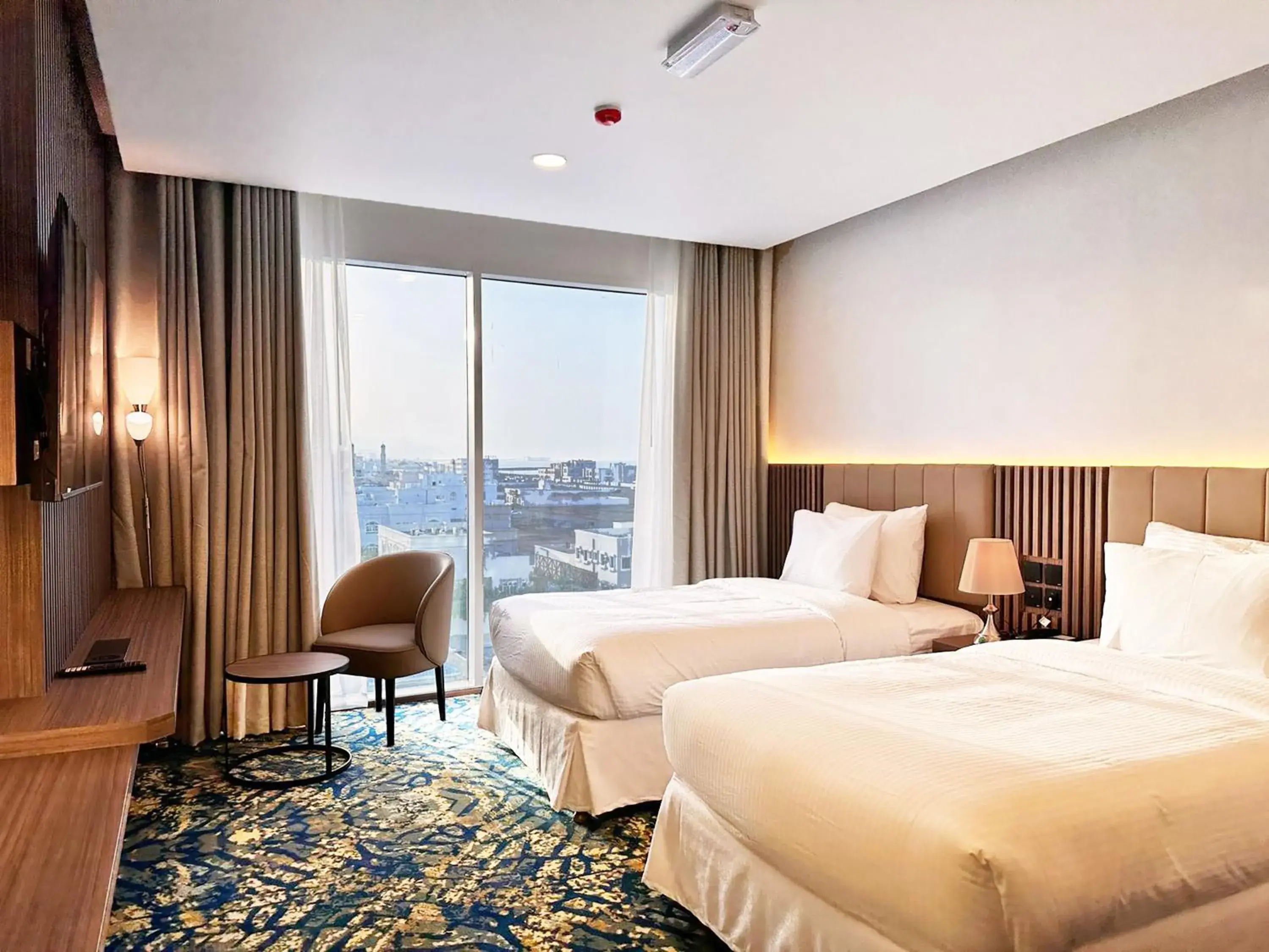 Superior Deluxe Twin room with Pool, Mountains and Partial Sea View in Sur Grand Hotel Superior Deluxe Twin room with Pool, Mountains and Partial Sea View in Sur Grand Hotel