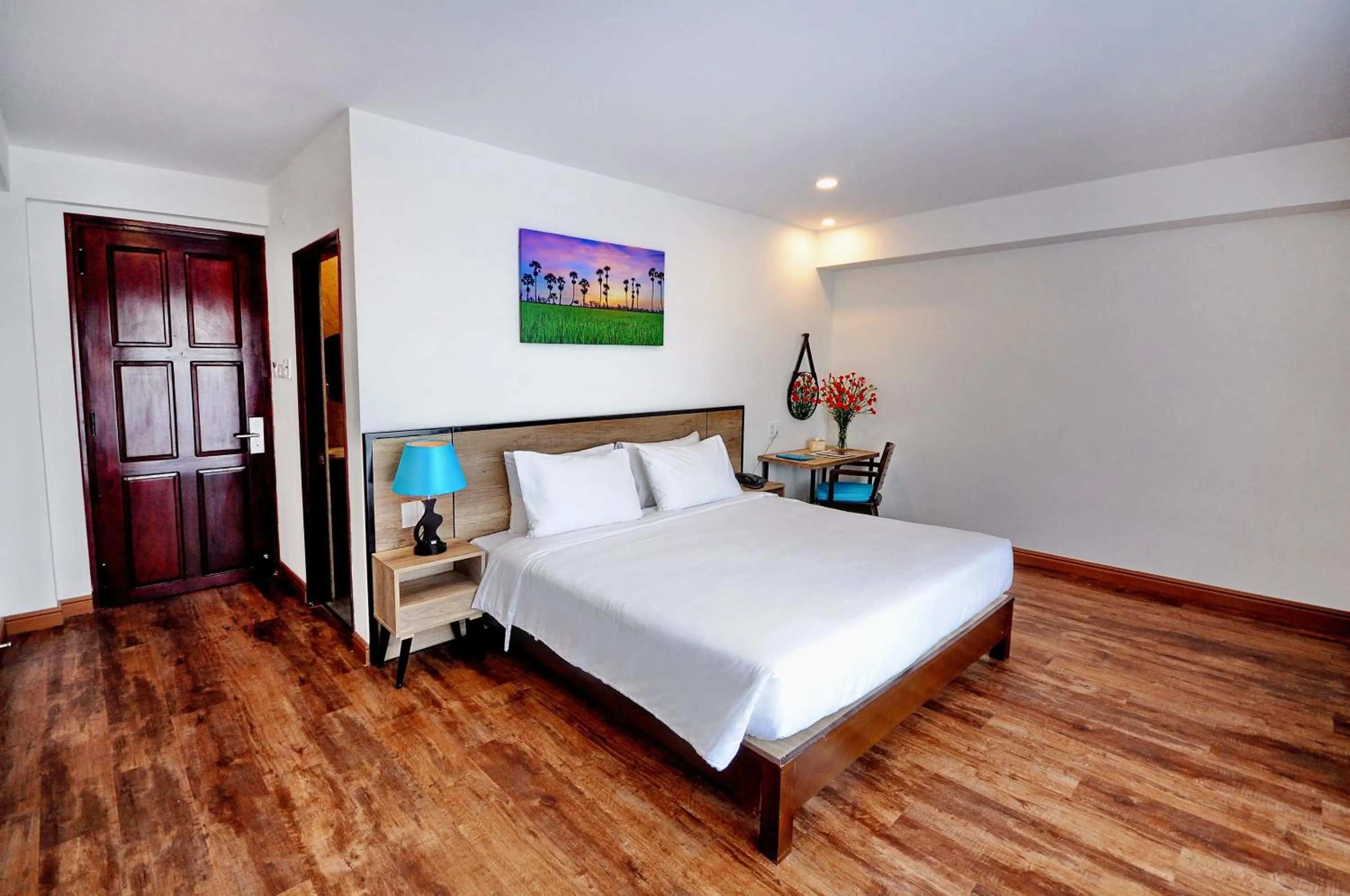 Bed in Golden Lotus Hotel