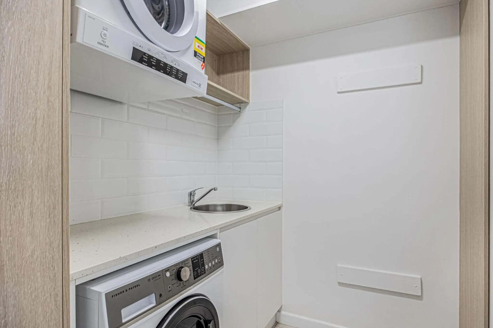 washing machine in Horizons Holiday Apartments - OFFICIAL