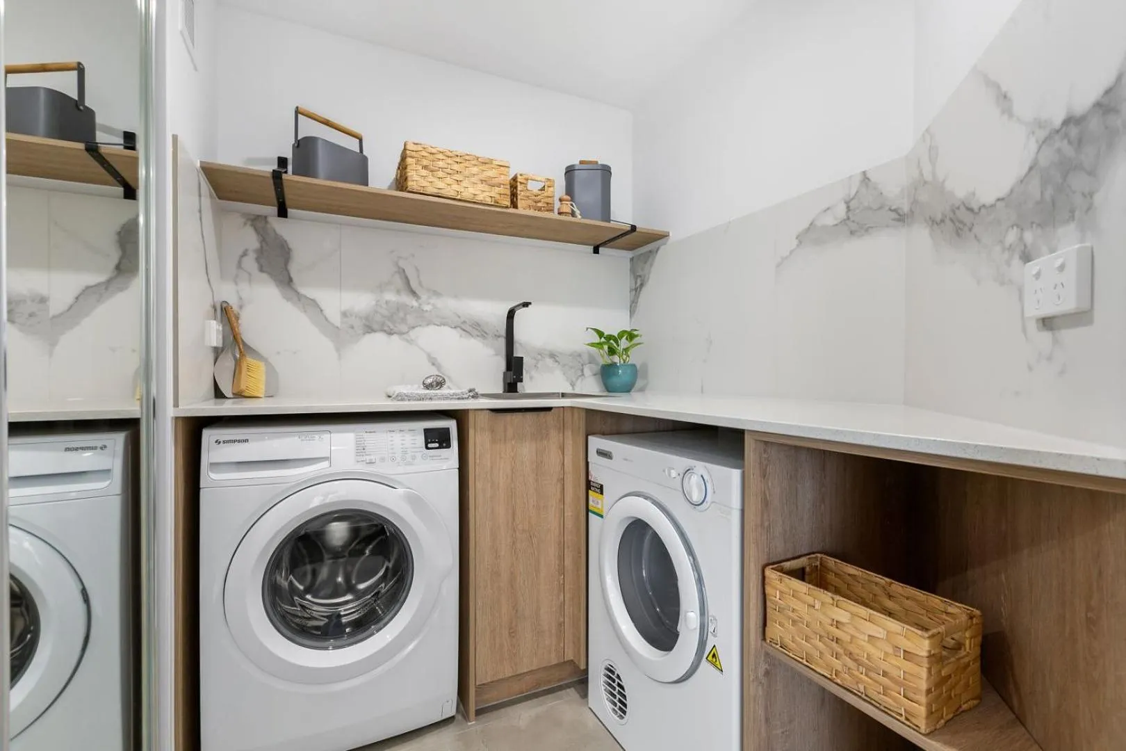 washing machine in Horizons Holiday Apartments - OFFICIAL