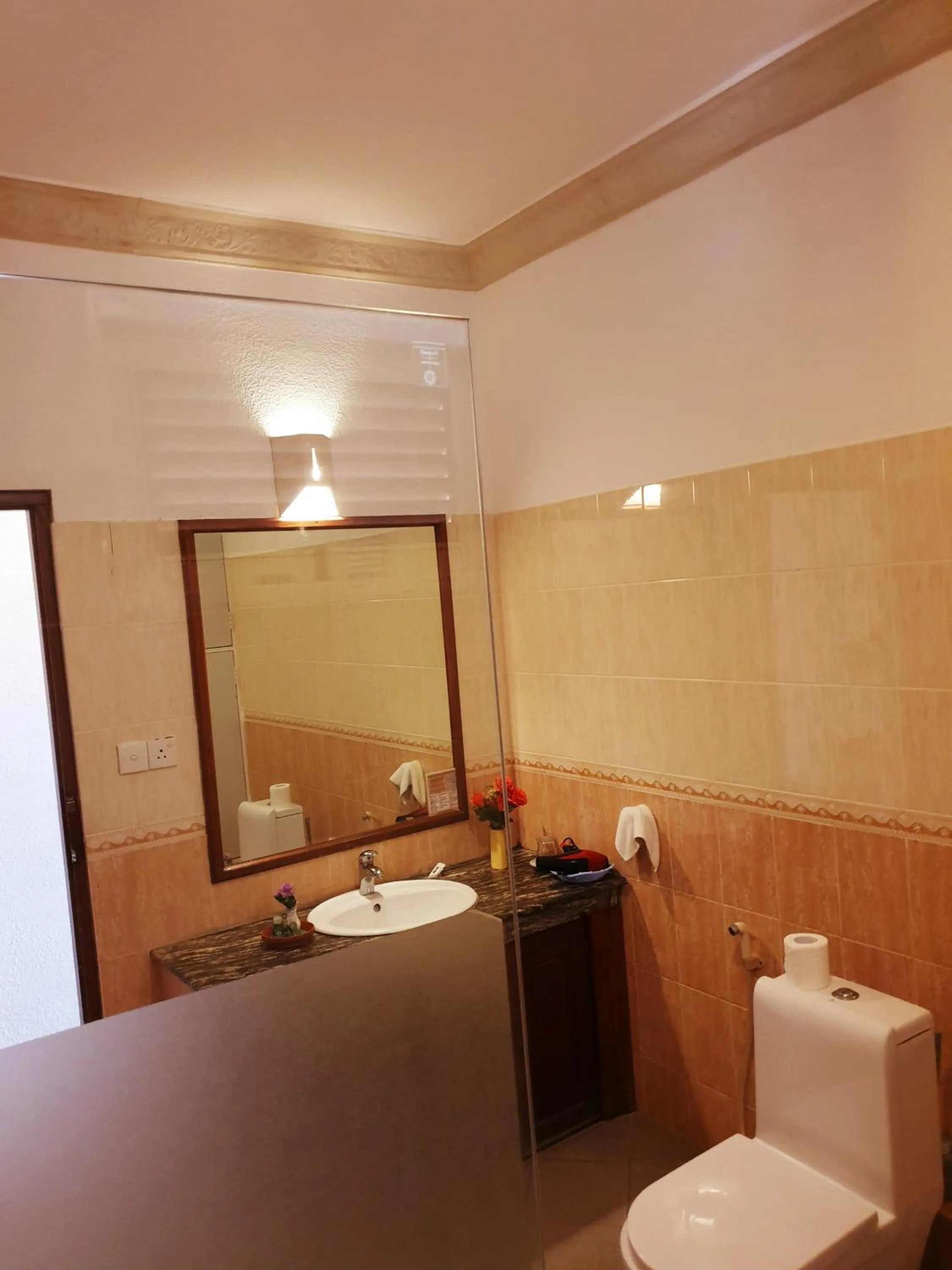 Bathroom in Oasey Beach Hotel