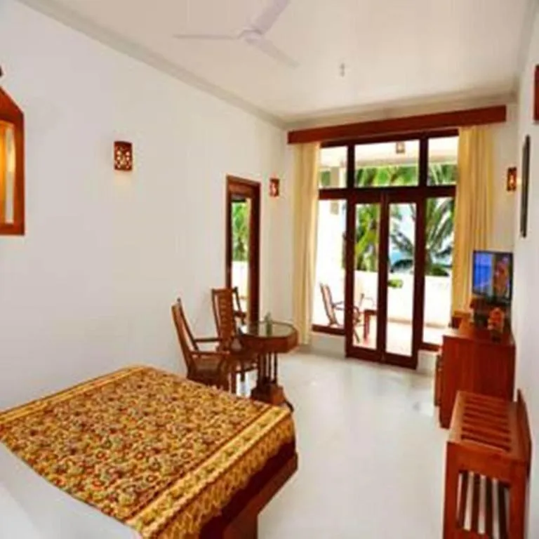 Bed in Oasey Beach Hotel