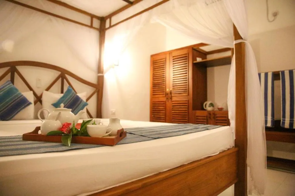 Bed in Oasey Beach Hotel