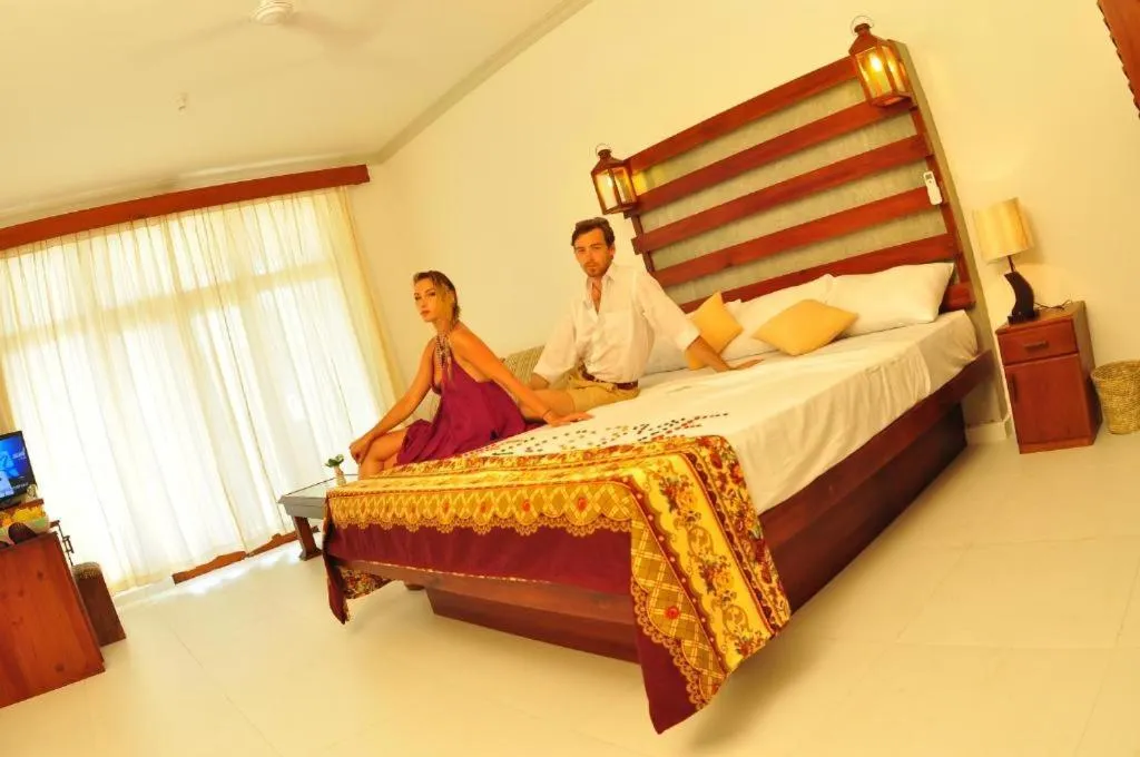 Property building, Bed in Oasey Beach Hotel