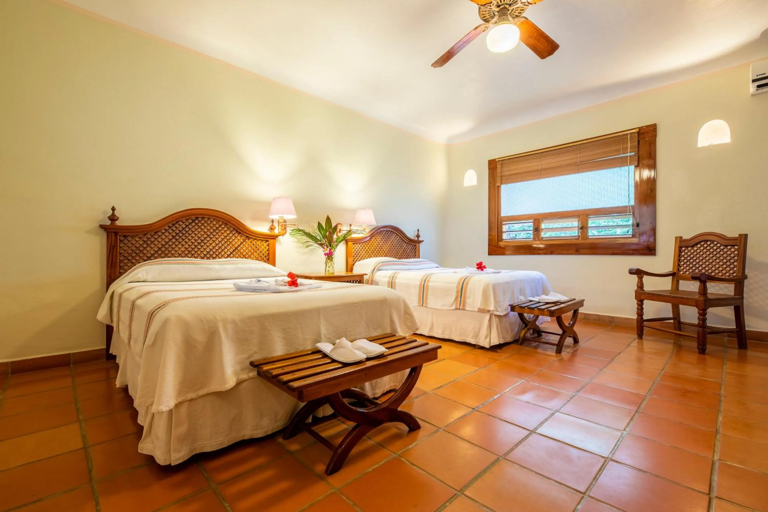 Photo of the whole room, Bed in The Lodge At Uxmal