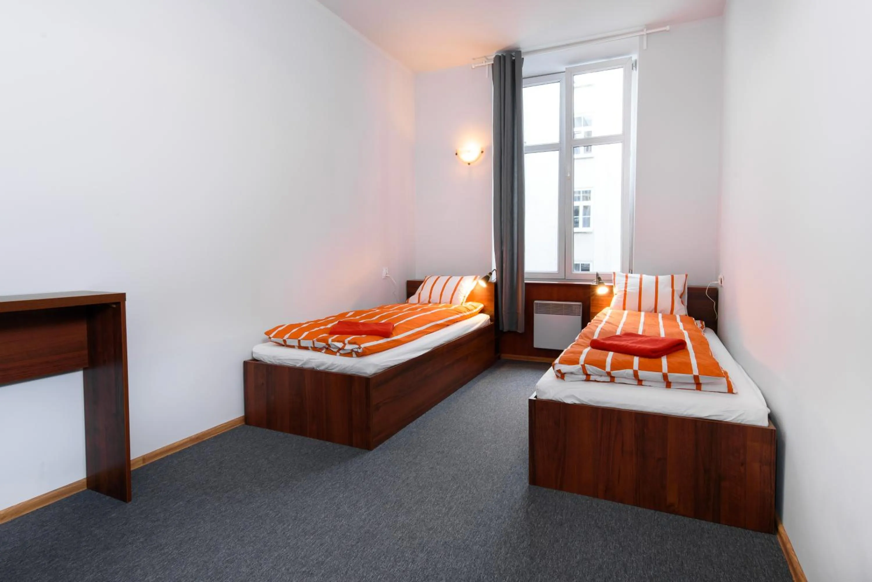 Bed in Constitution Square Rooms