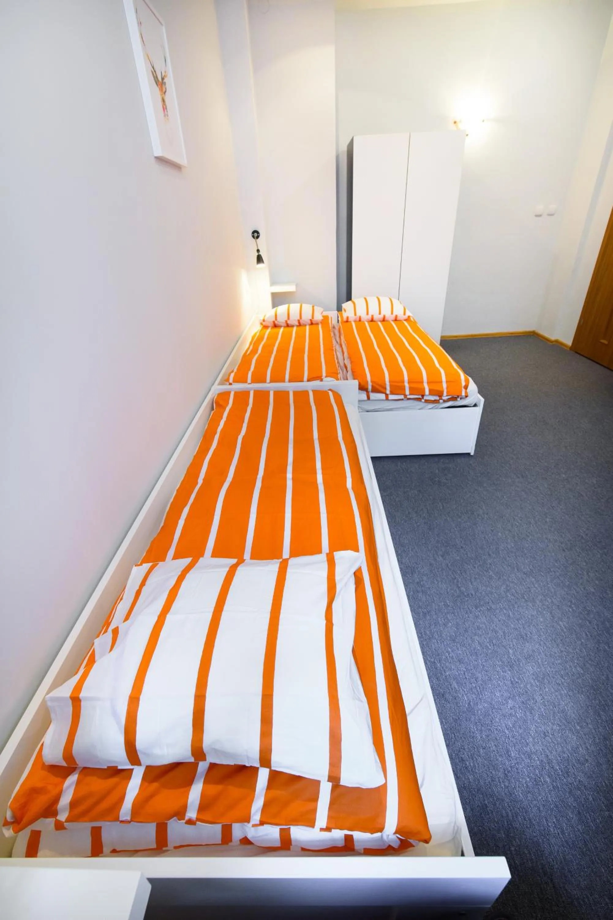 Bed in Constitution Square Rooms