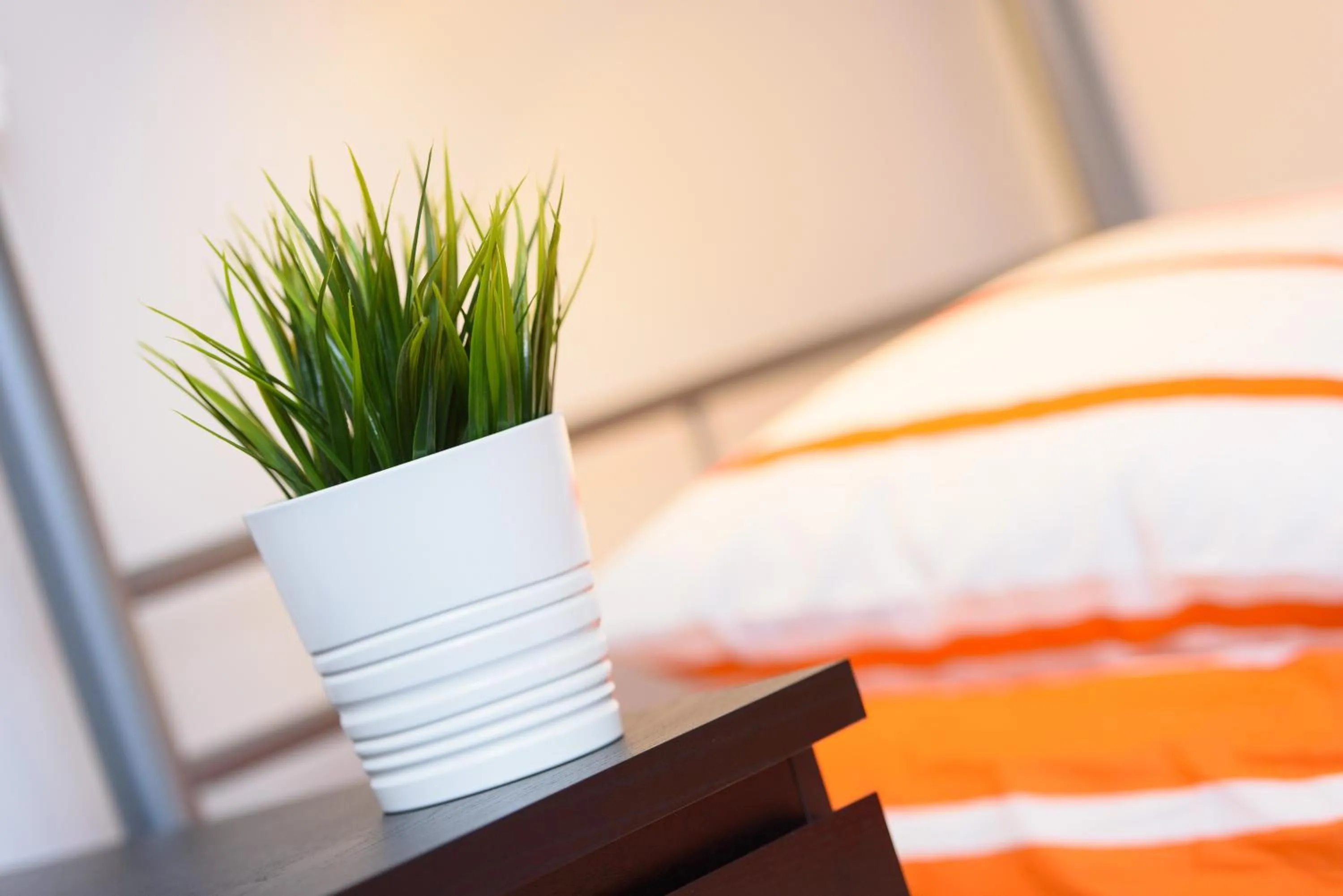 Bed in Constitution Square Rooms