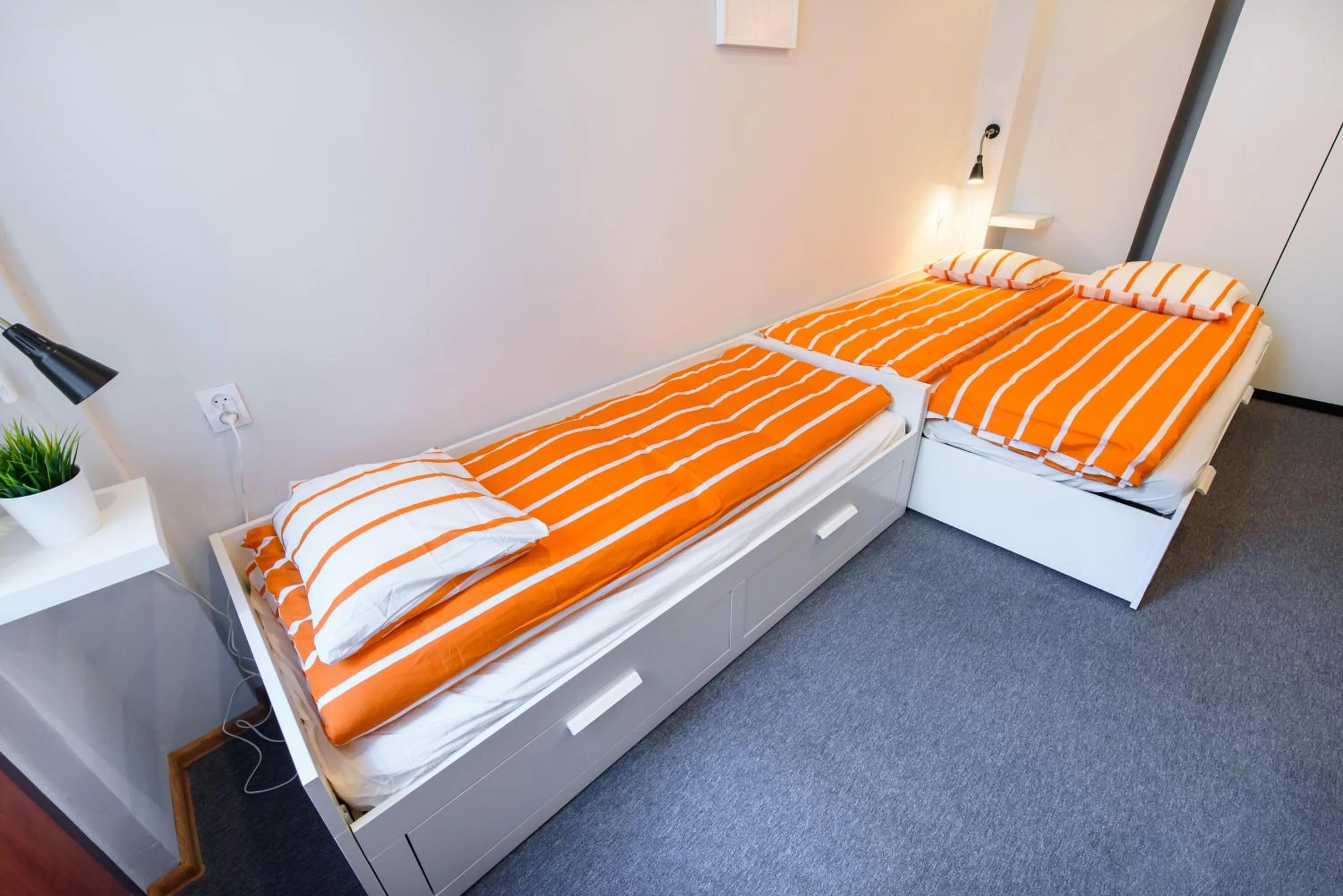 Bed in Constitution Square Rooms