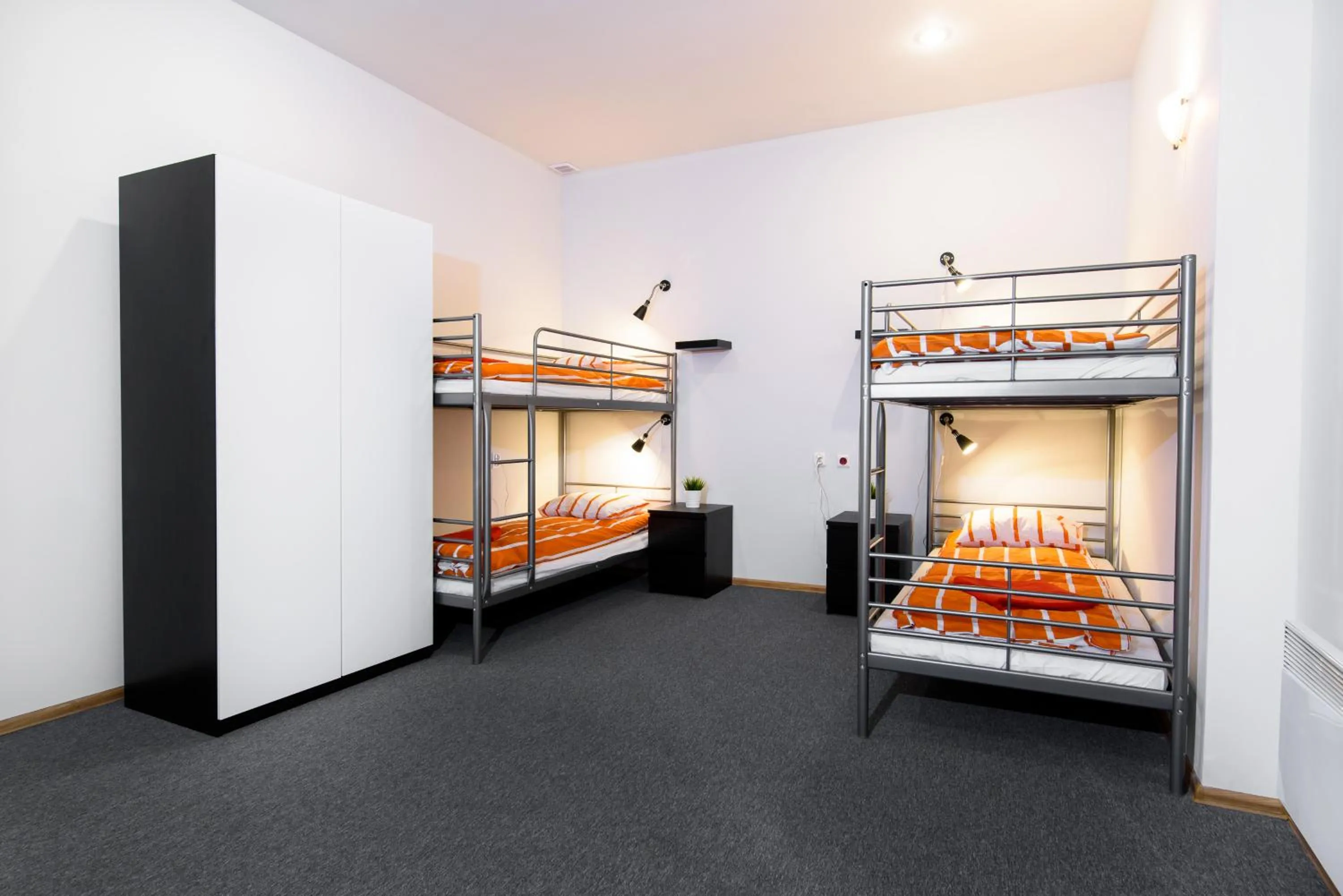 Bed in Constitution Square Rooms