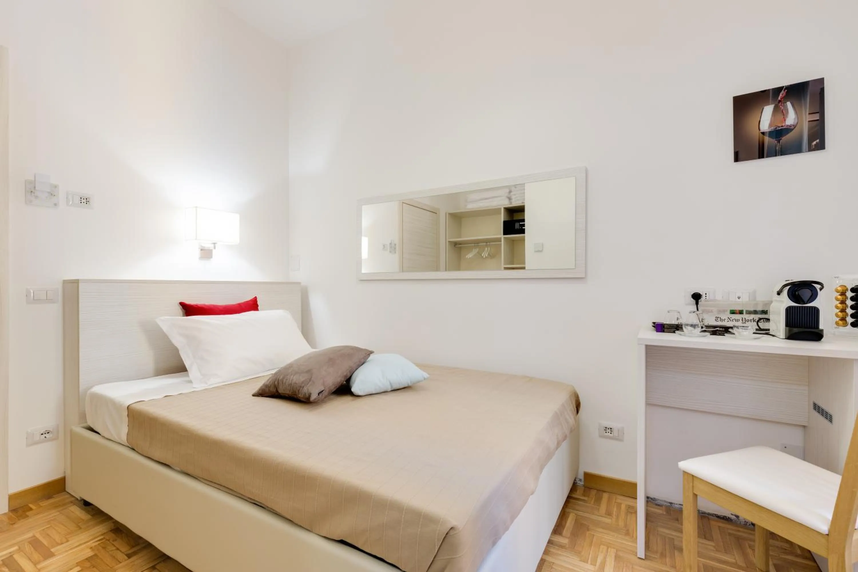 Bed in Dolce Luxury Rooms